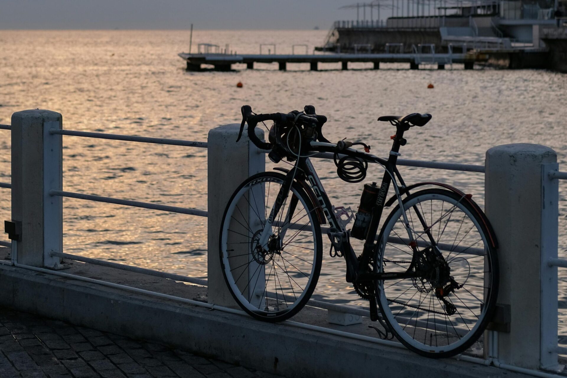 Bicycle on Seaside Promenade at Sunset