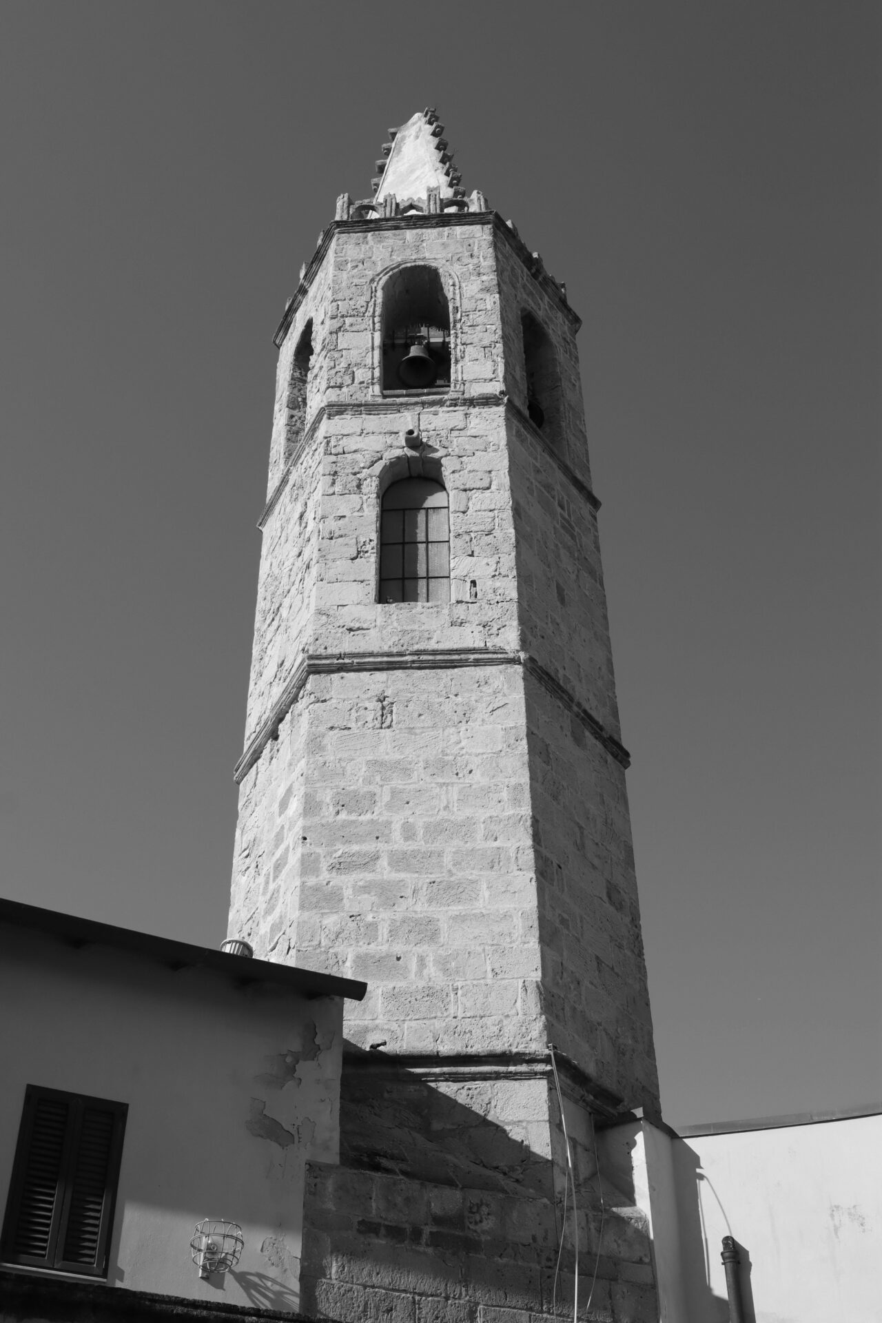 Stone bell tower of the Church of San Francesco in Alghero