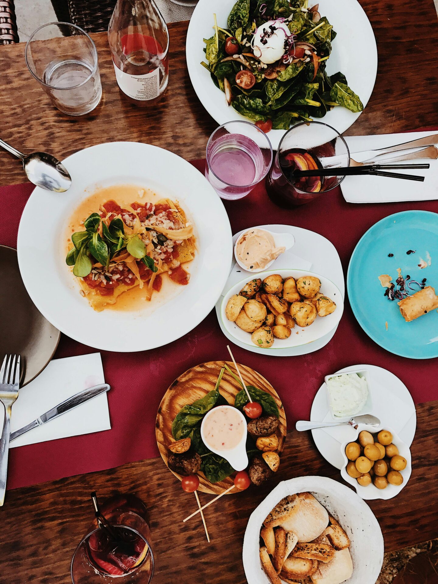Table filled with traditional Cretan dishes showcasing cultural cuisine
