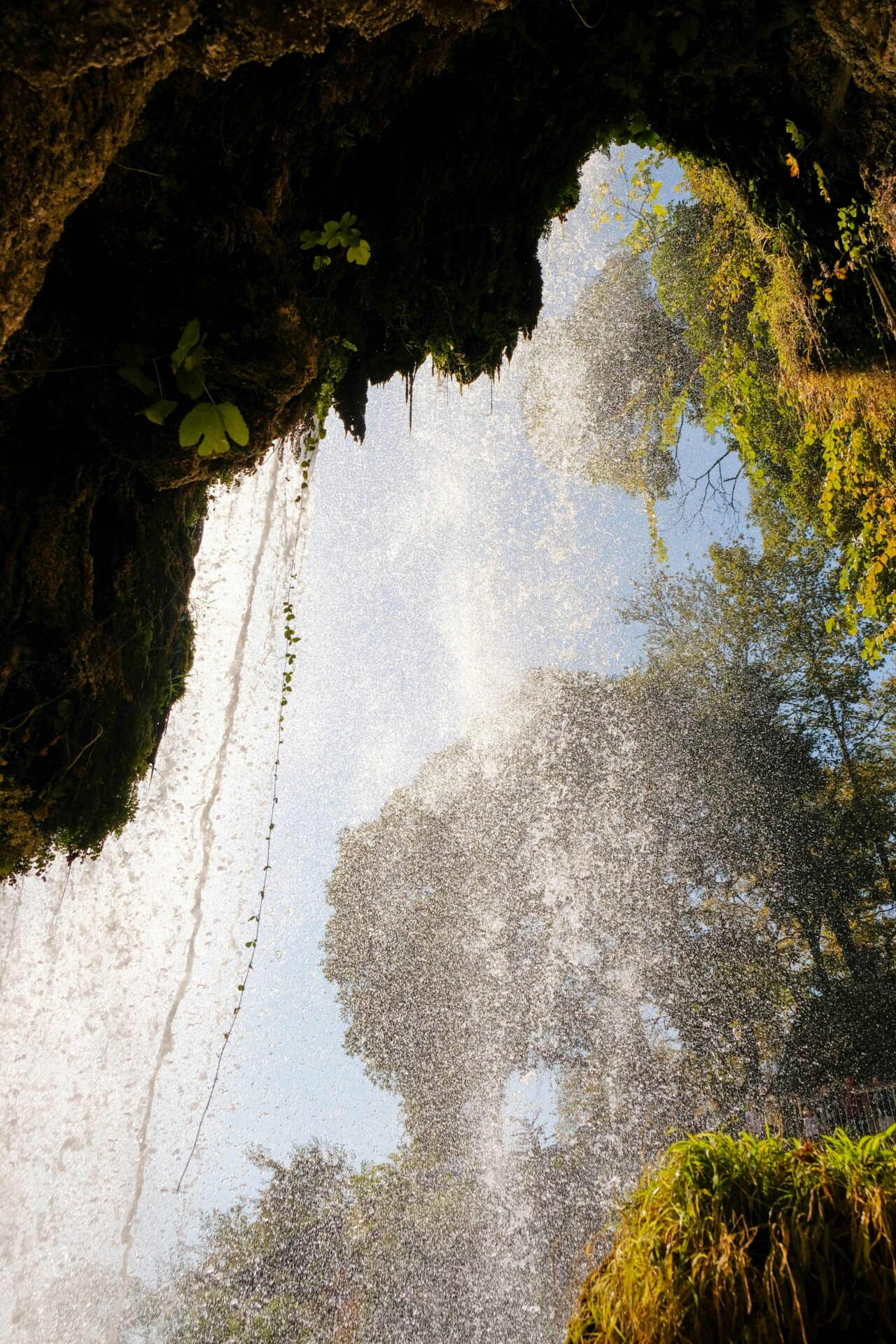 Powerful waterfall in Edessa, Greece, plunging from a cliff into a misty gorge