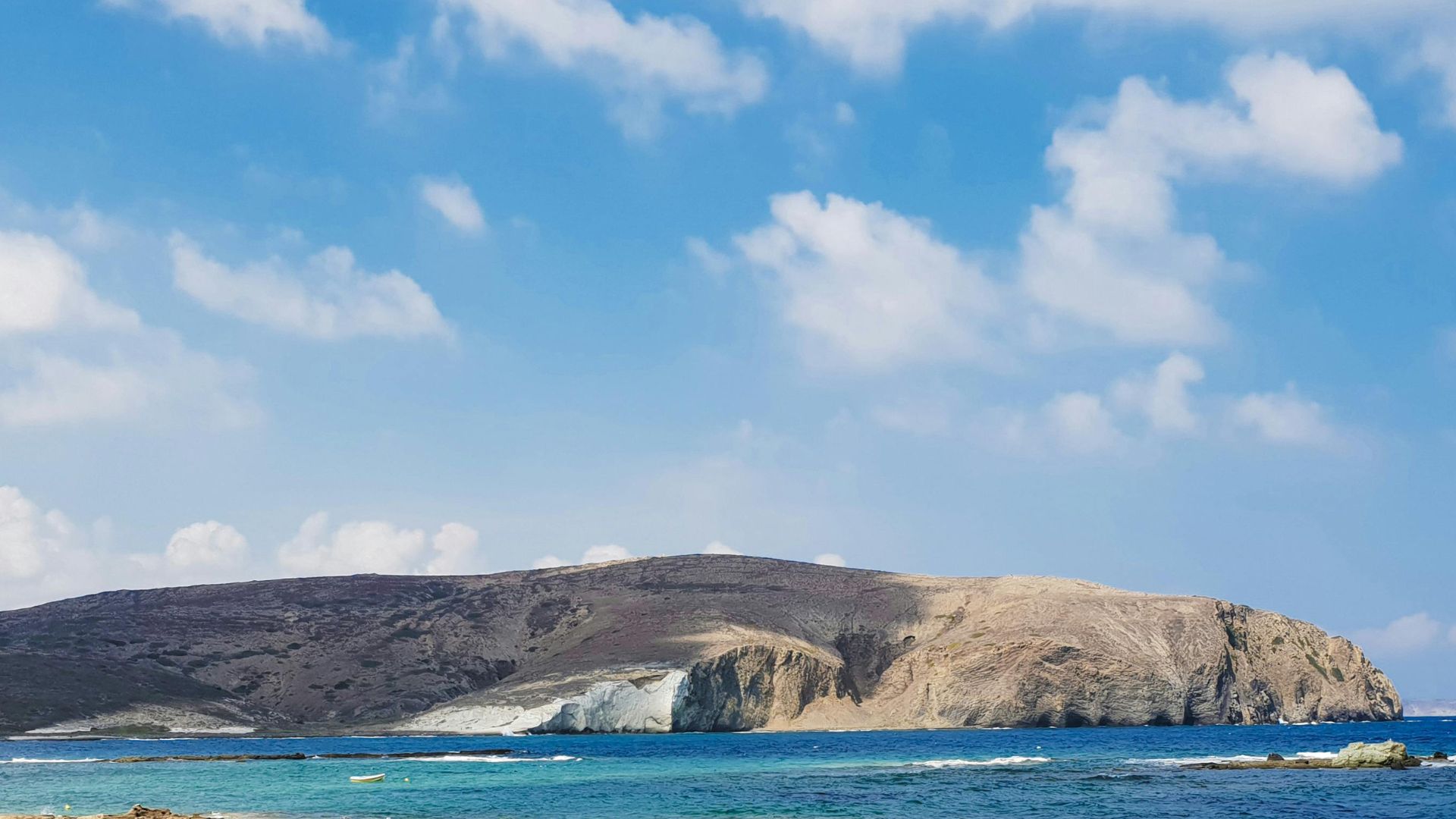 Panoramic view of Gavdos Island, Greece, showing its varied terrain and coastline.