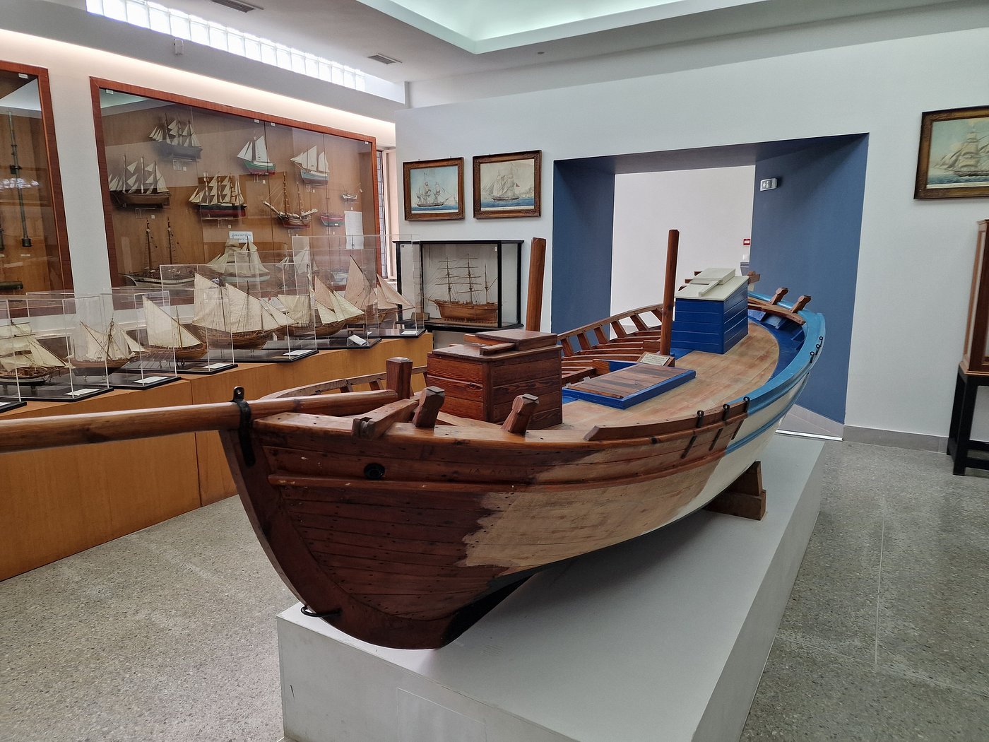 Exhibit of traditional boat models at the Maritime Museum in Piraeus, Greece.