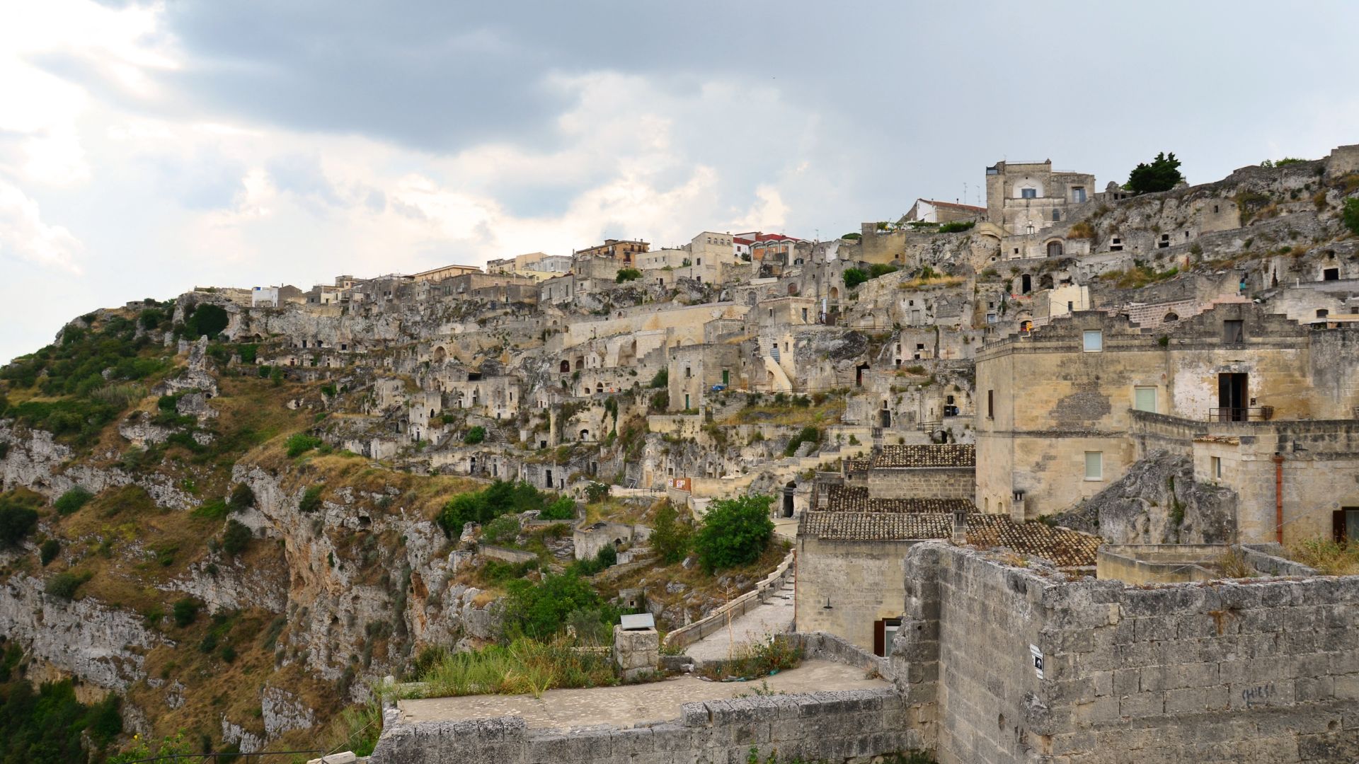 The image shows the Sassi di Matera, located in the Basilicata region of southern Italy.