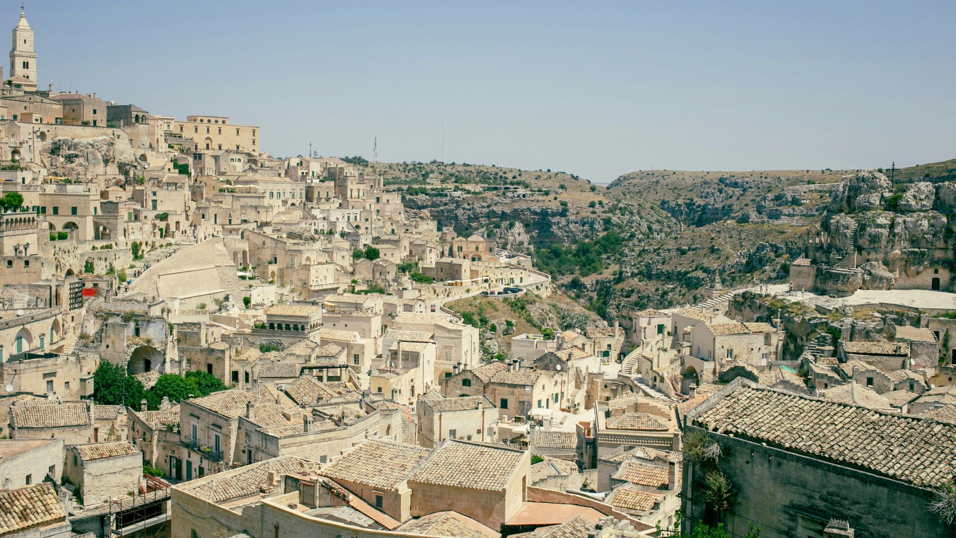 Image shows aerial view of houses in Matera, Basilicata, Italy.