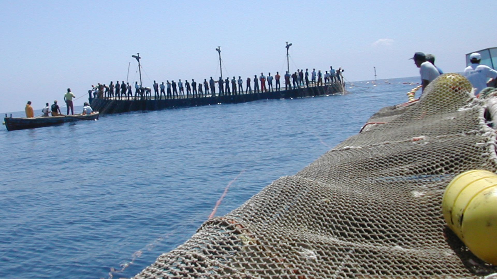 Group of men on a boat for Mattanza (Tuna hunt).