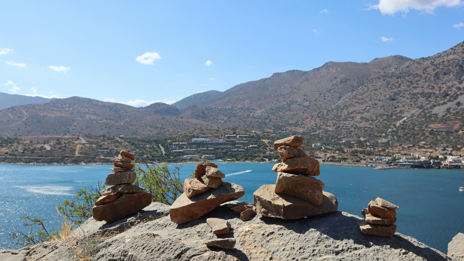 Rock cairns overlooking Mirabello Bay in Elounda, Crete.