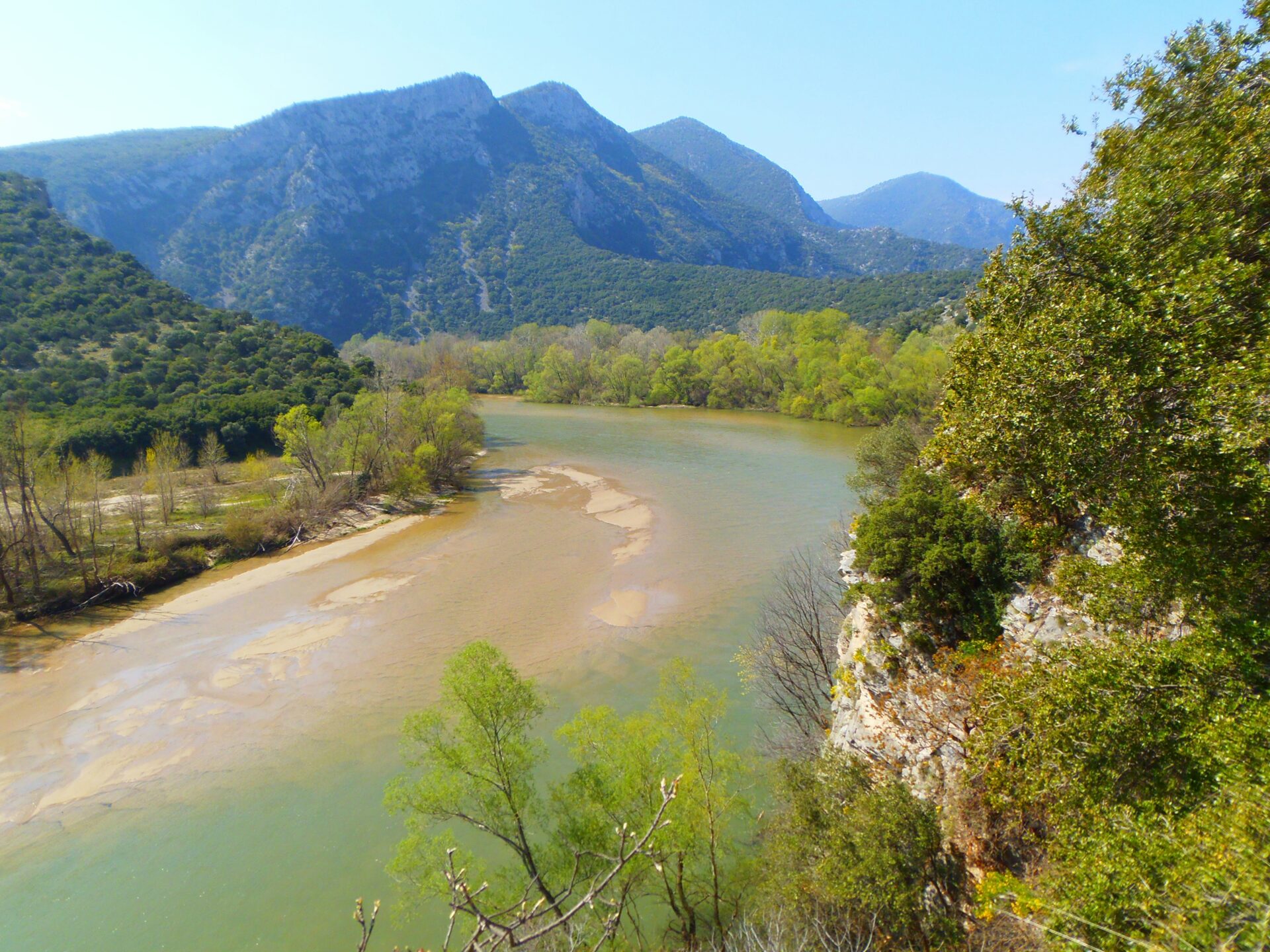 Scenic view of the Nestos River winding through green hills