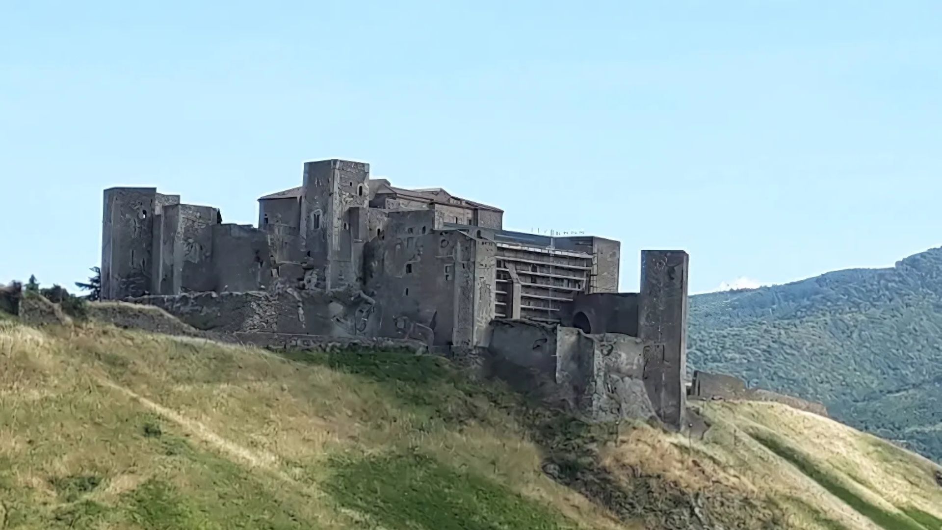 Image shows Norman Castle of Melfi, Italy.