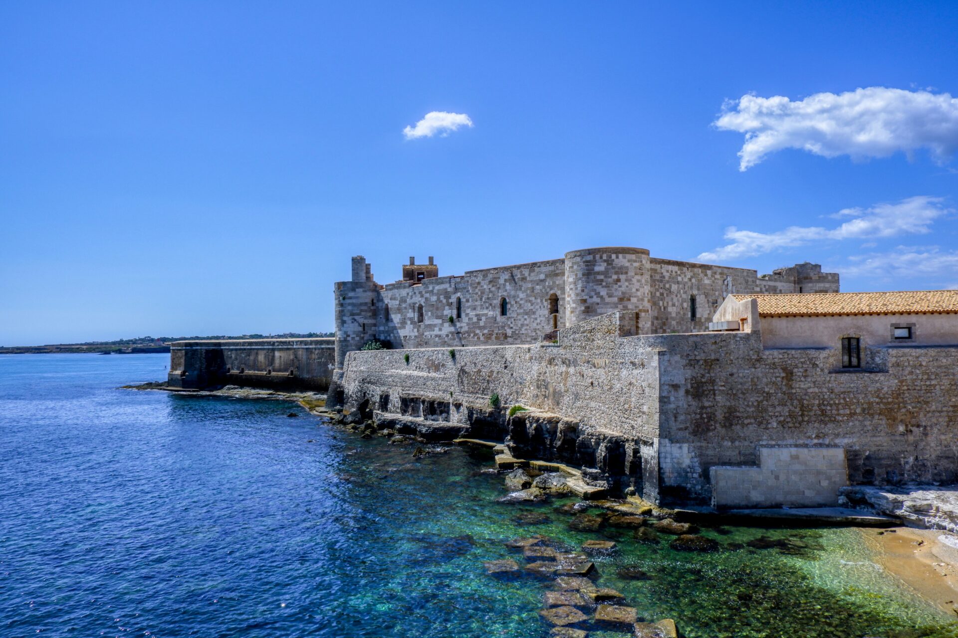 Ortigia’s coastal architecture blending ancient walls
