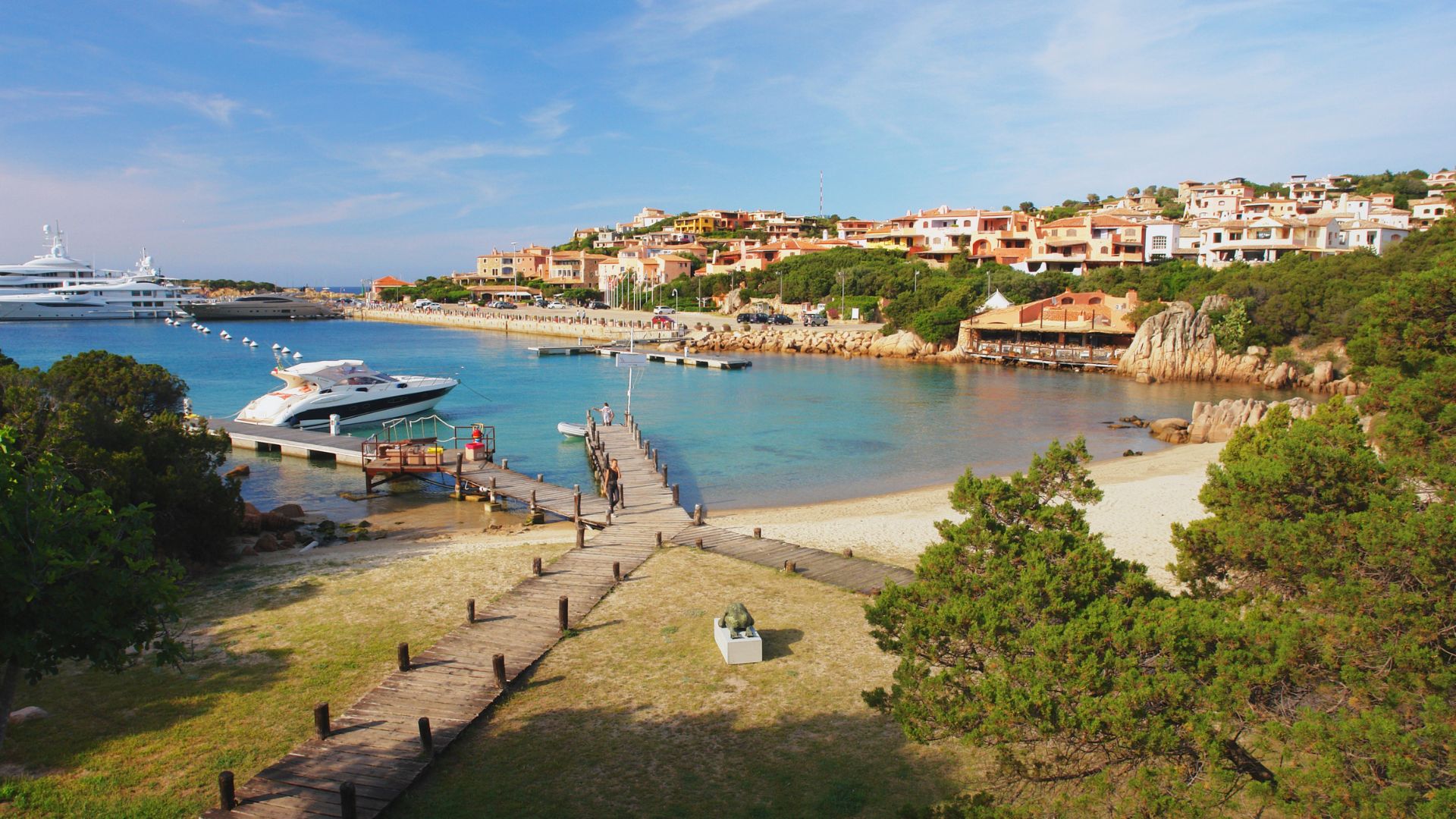 The image shows Porto Cervo, a luxury resort town located in northern Sardinia, Italy