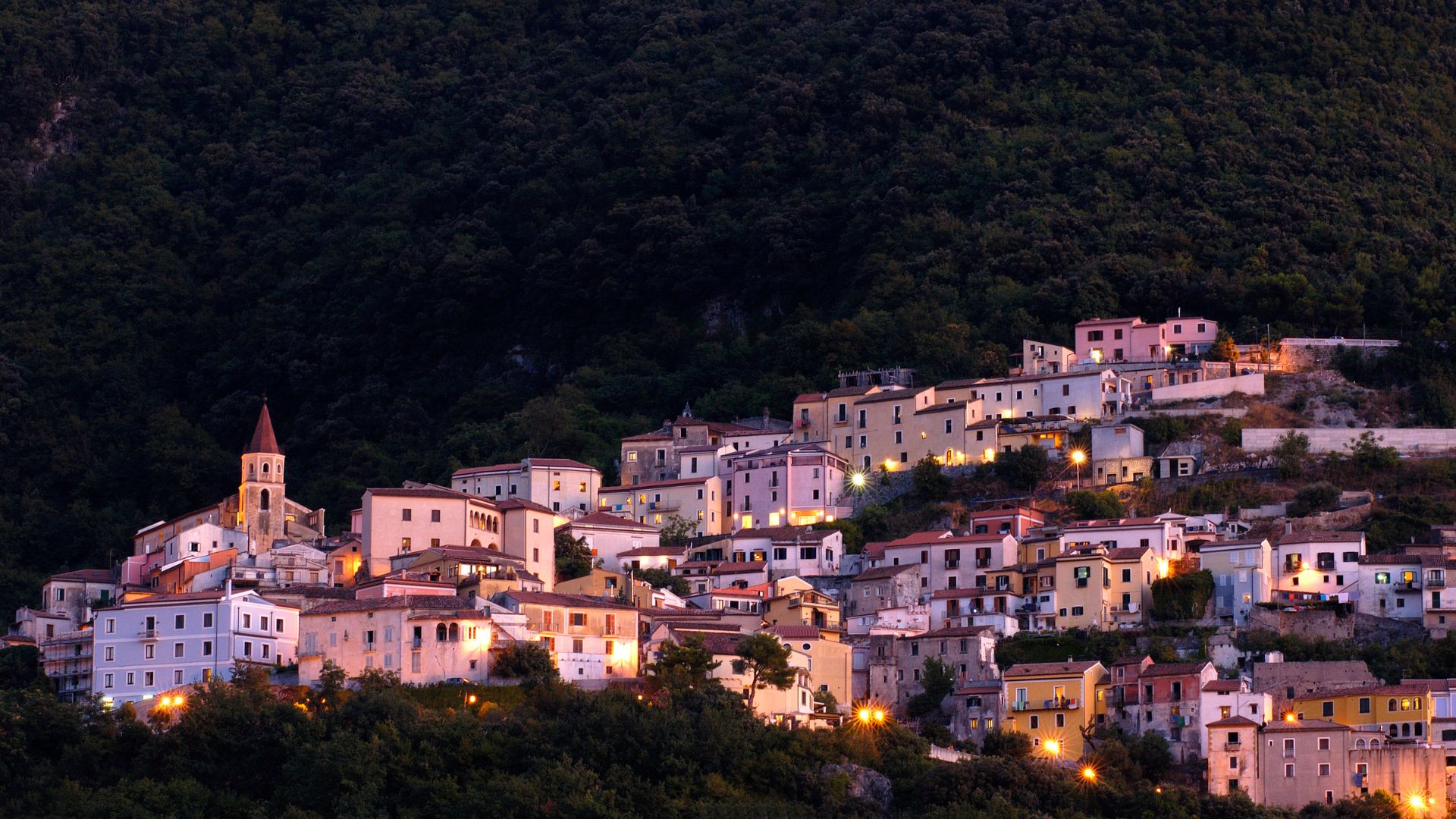 Image shows house at night of Potenza, Basilicata, Italy. 