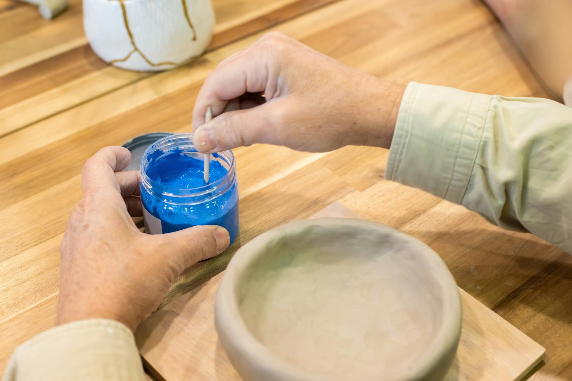 Pottery bowl with a blue paint