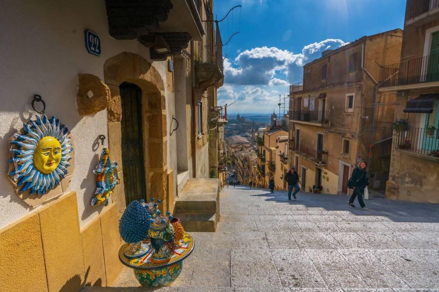 Climbing 142 Unique Steps: My Colorful Journey Up Santa Maria del Monte