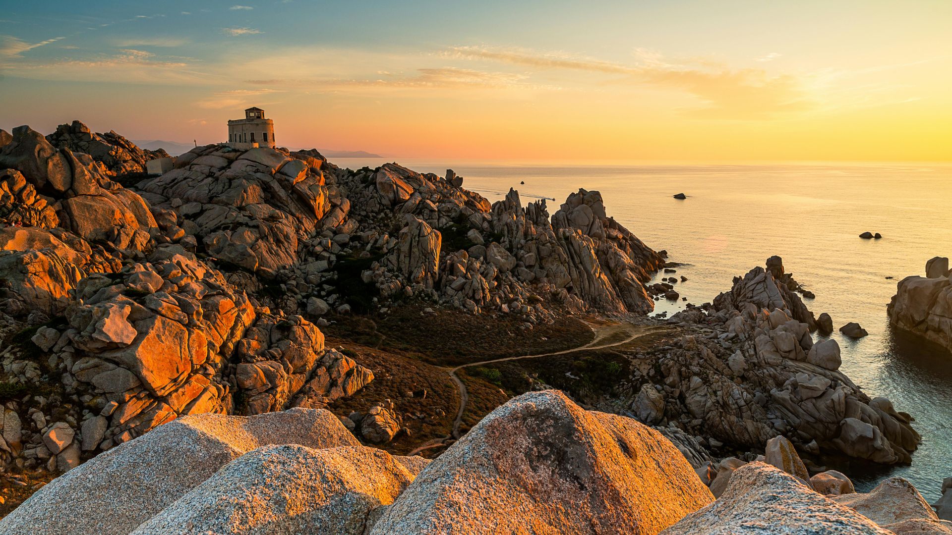 Beutiful sunset at Santa Teresa Gallura, Sardinia, Italy characterized by rocky beach.