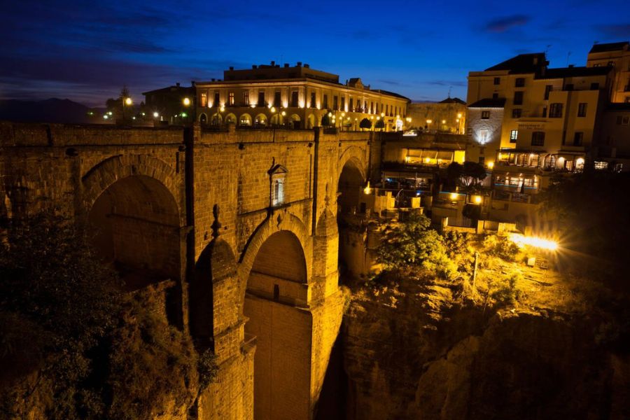 Ronda's Puente Nuevo: Gazing into the El Tajo Gorge – A Vertigo-Inducing View That Defines Dramatic Spain