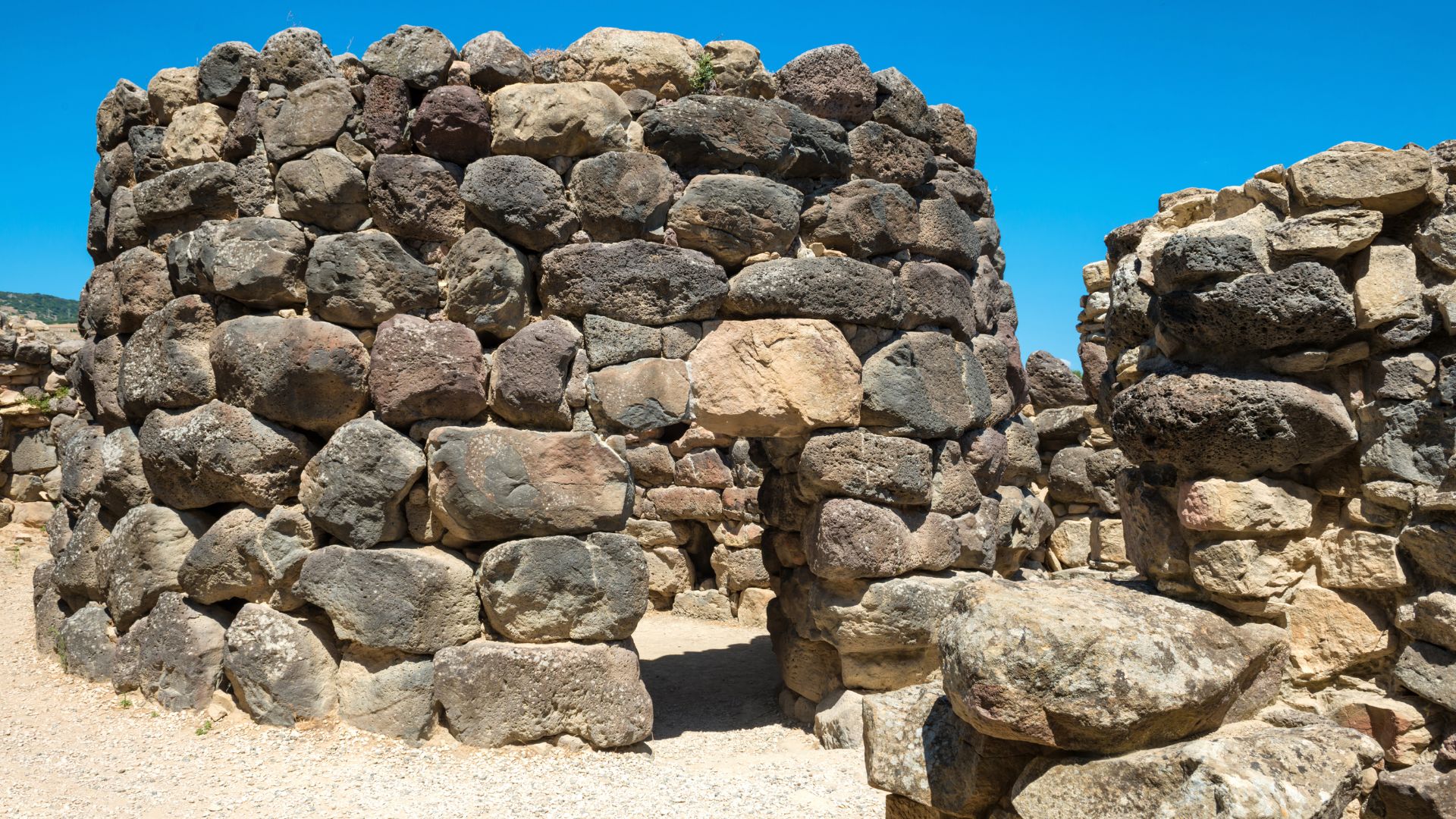 Closer look of Su Nuraxi, a large, complex nuragic archaeological site in Sardinia, Italy.