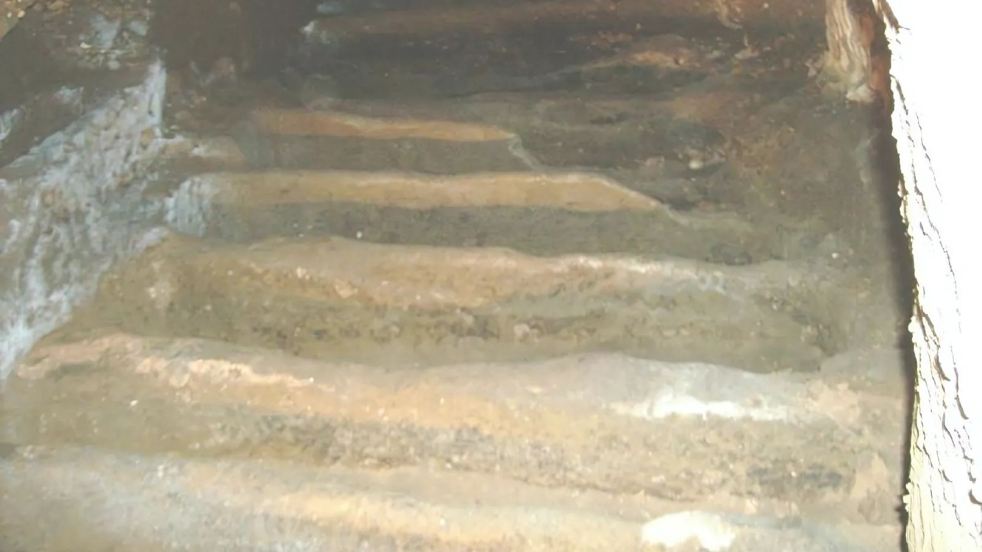 Image shows stairs in  the Jewish catacombs of Venosa