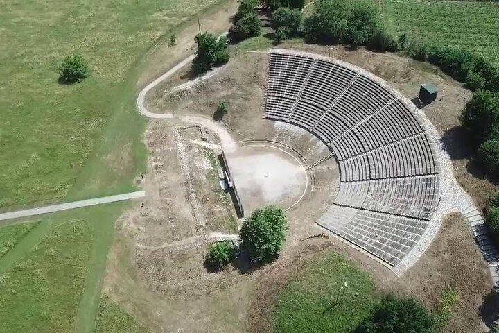 Stone seats of the ancient theatre at Dion Archaeological Site.