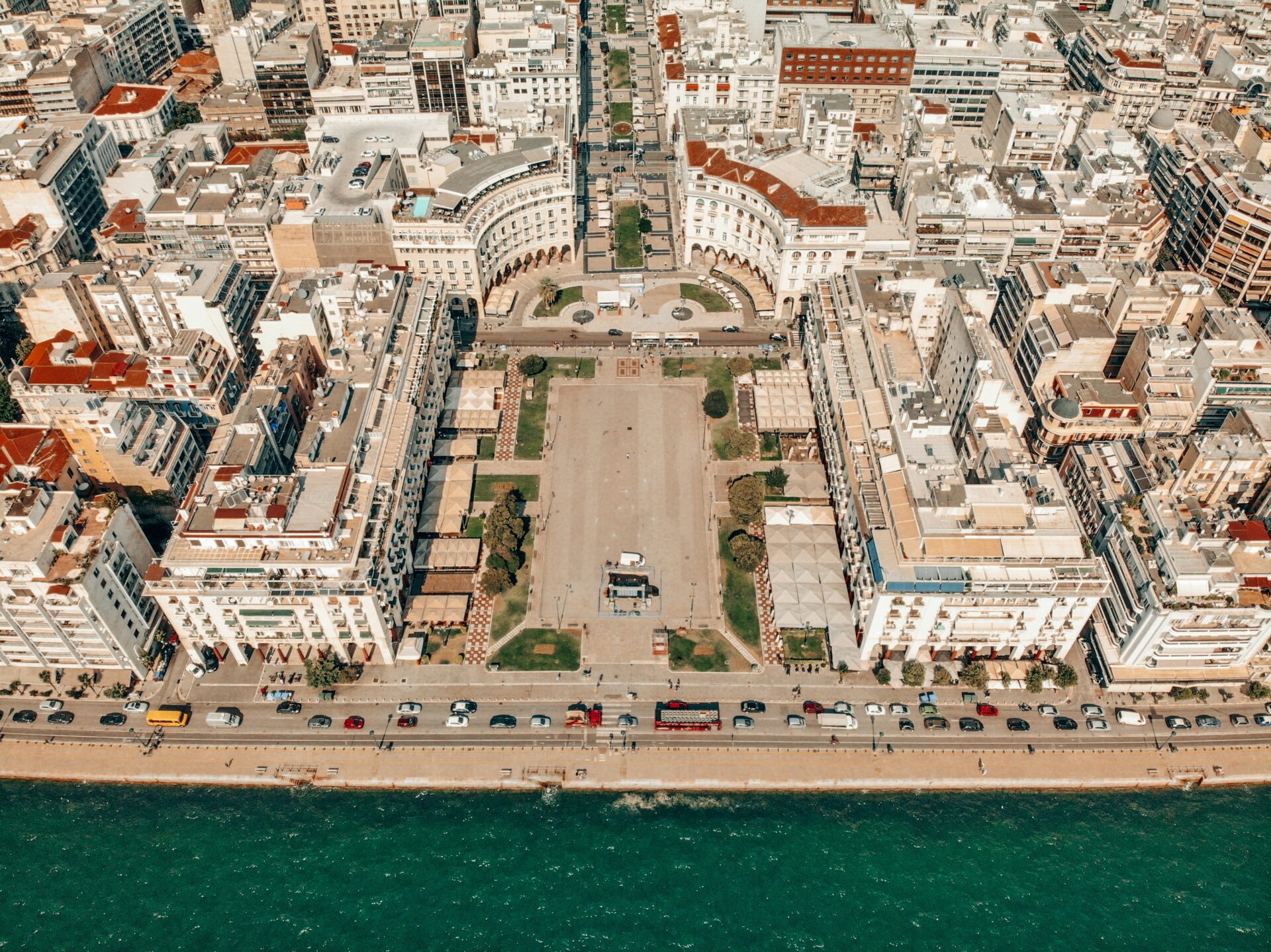 Historic neoclassical buildings lining a street in central Thessaloniki