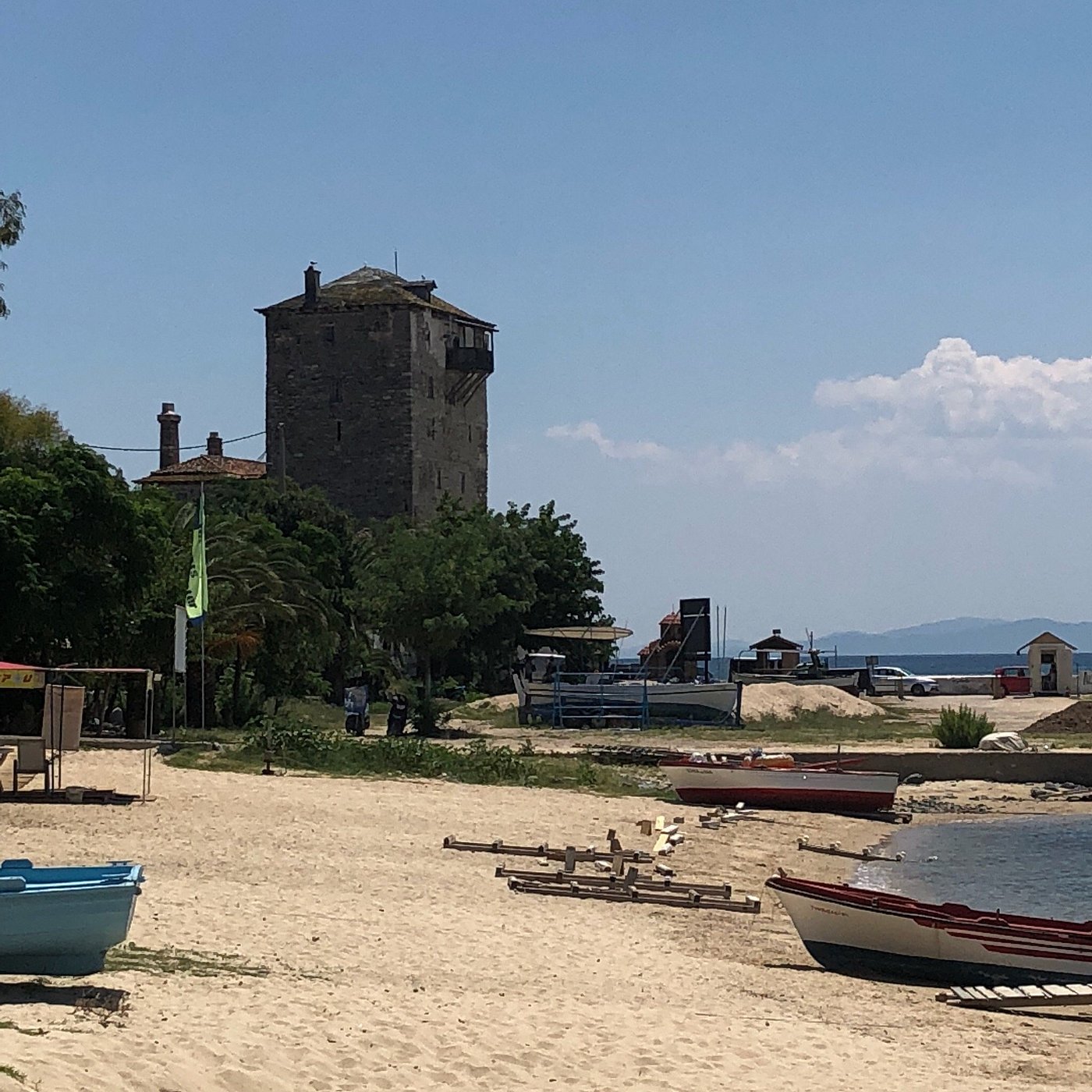 Byzantine Tower of Ouranoupolis standing at the edge of the beach