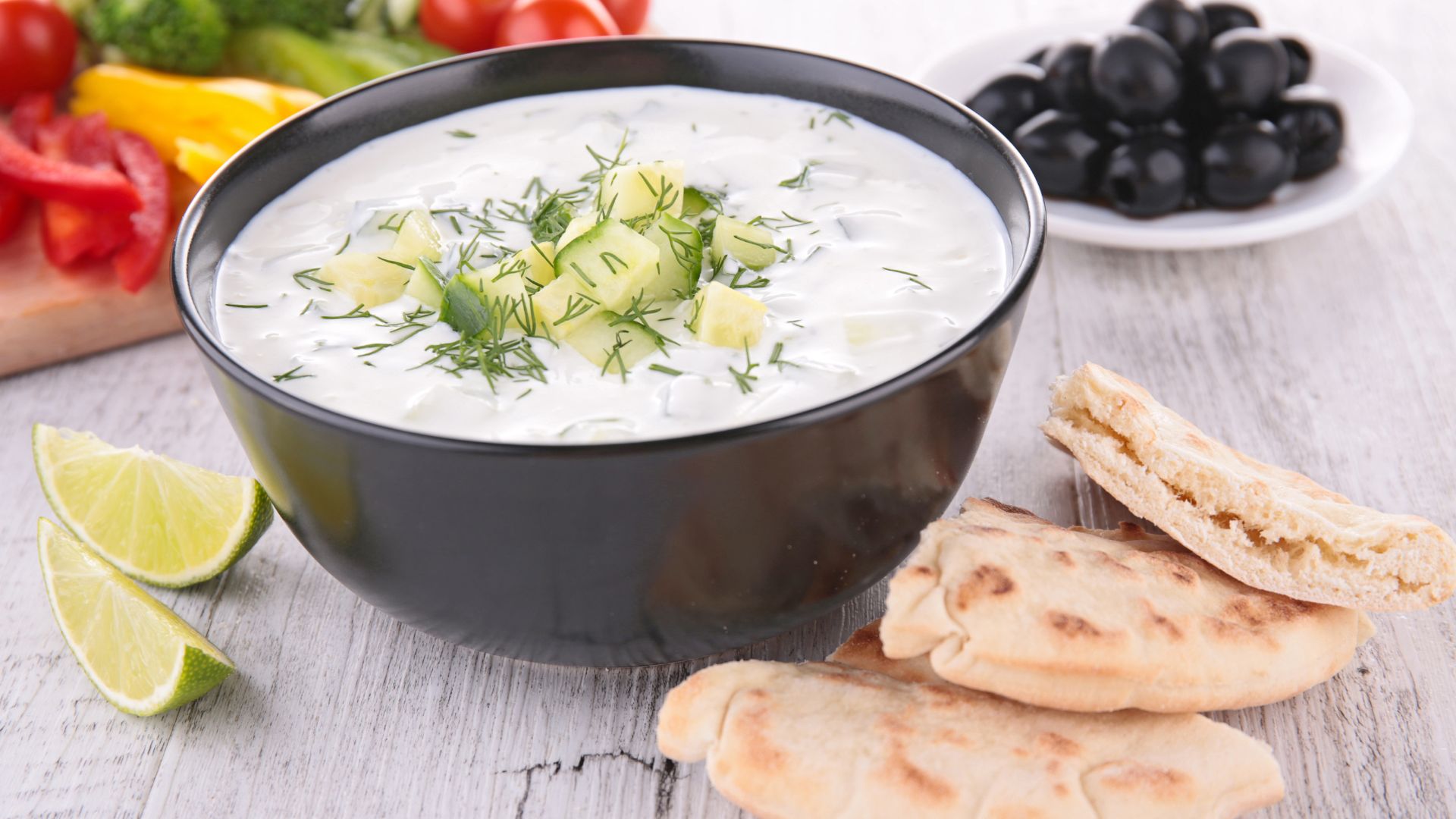 Thick yogurt, cucumber, and garlic—always a cool, creamy dip with pita bread.