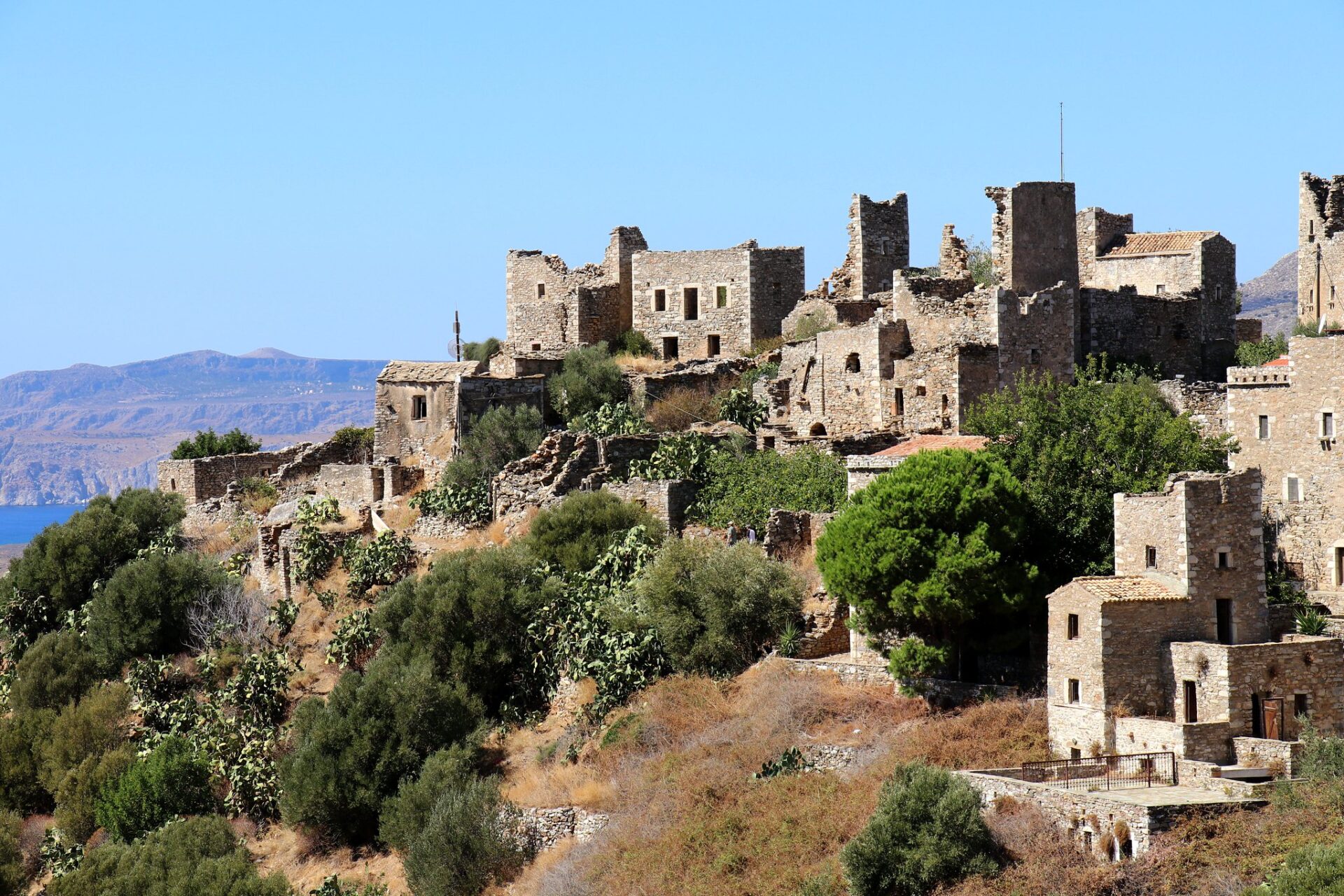 Vatheia village, with its ancient stone buildings and towers rising against the rugged landscape of the Mani Peninsula.