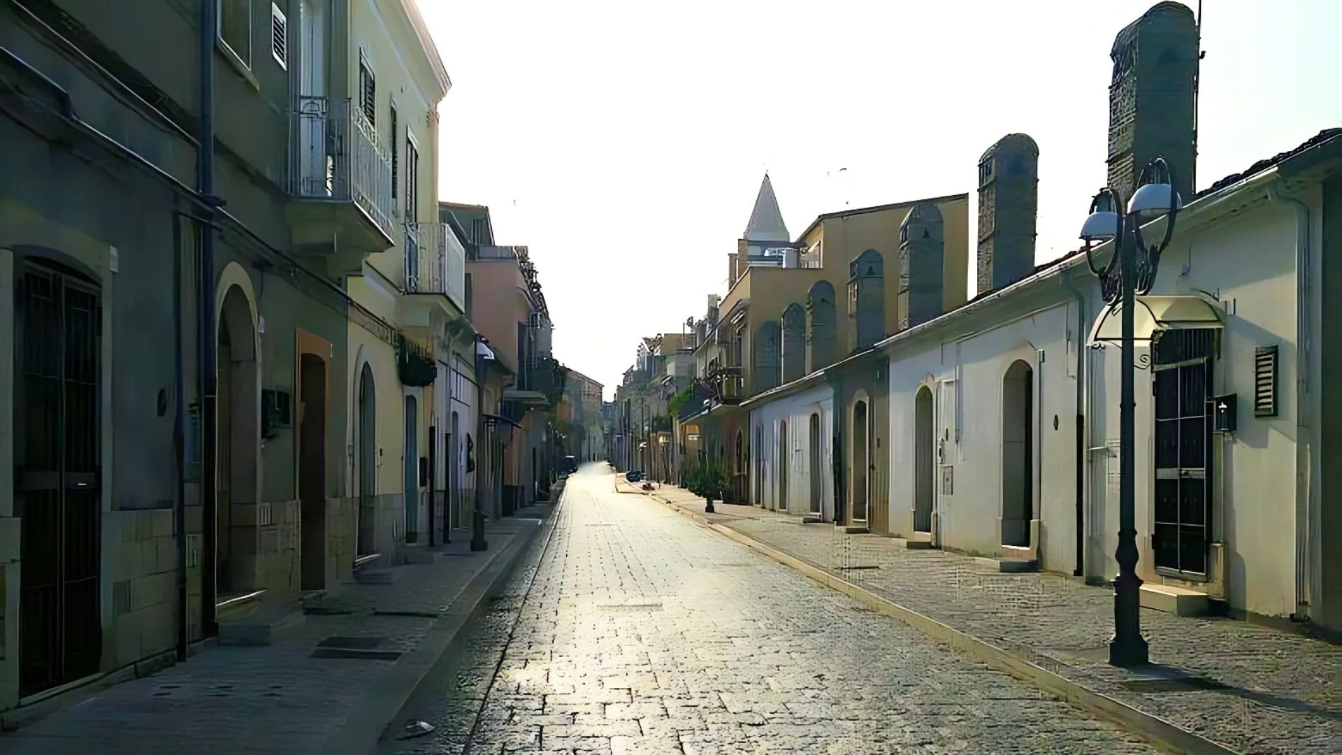 Image shows a street in Venosa, Italy