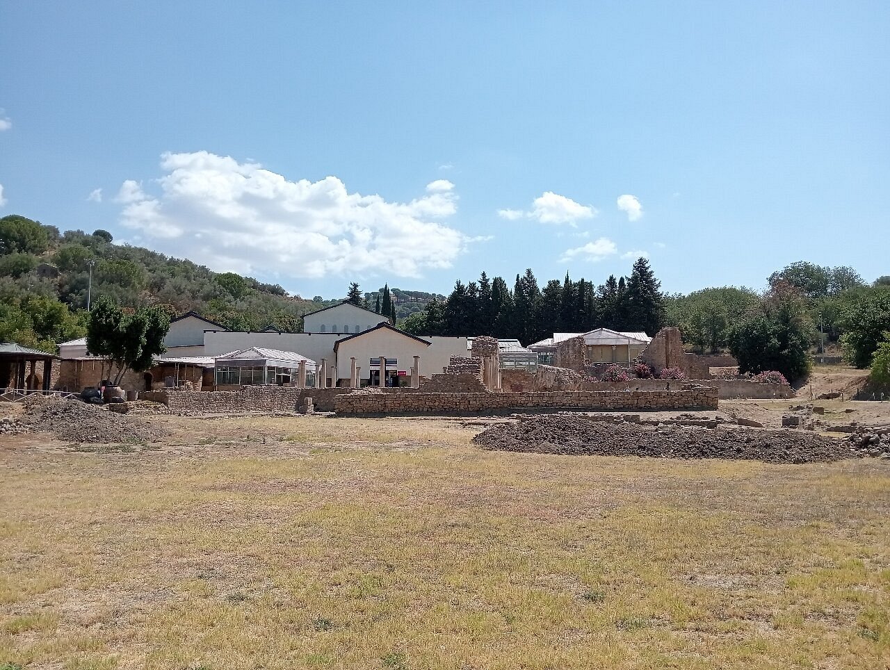 Overview of the Roman villa’s archaeological ruins surrounded by Sicilian hills