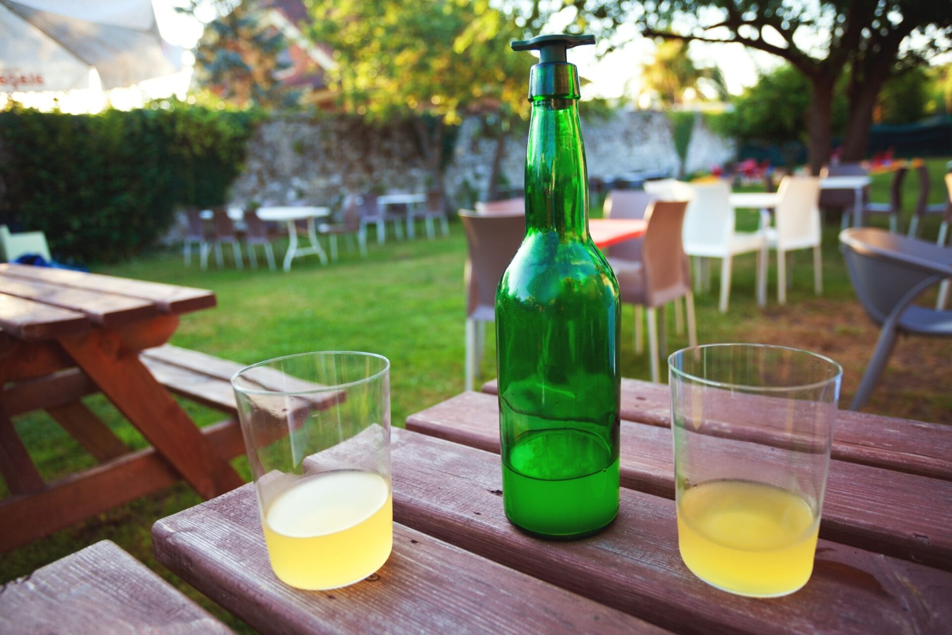 bottle and glasses of cider