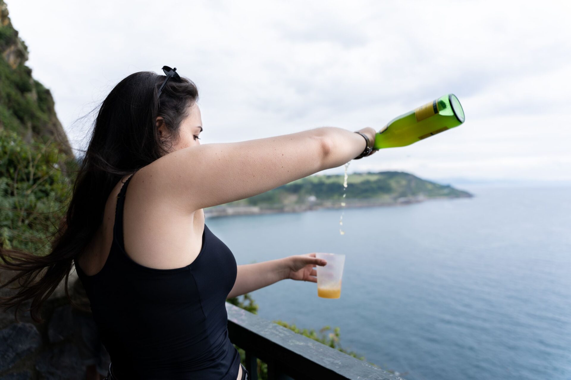 woman pouring cider
