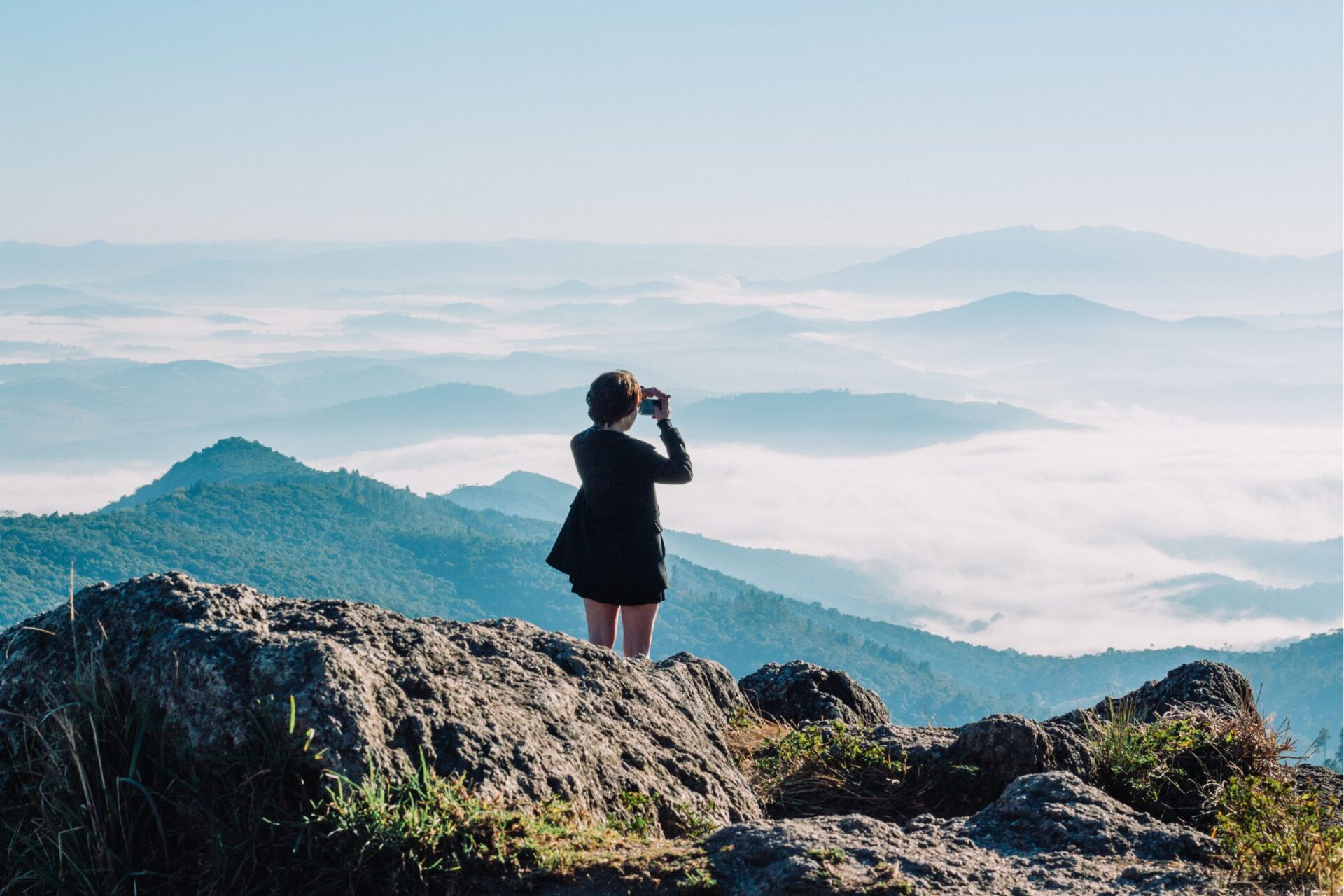 taking pictures on a hilltop