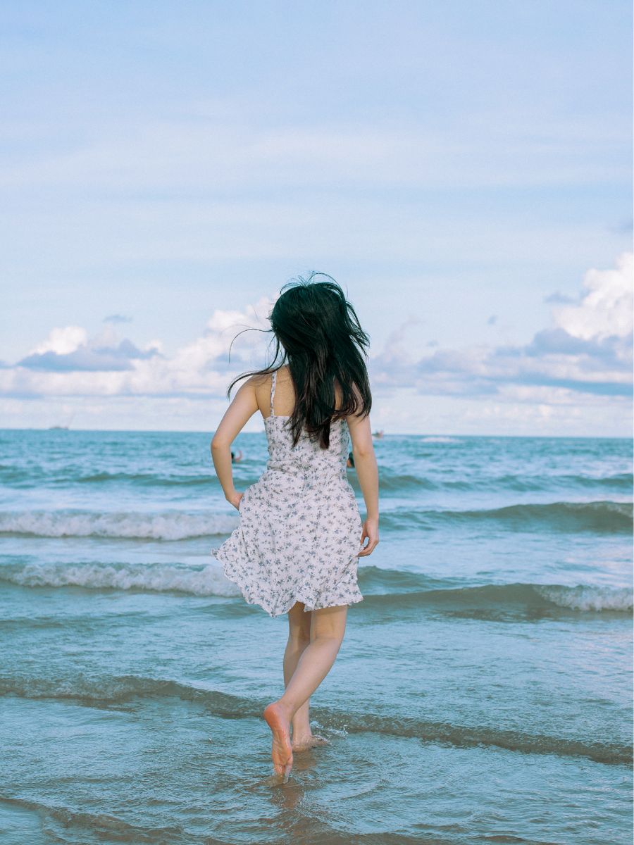 woman walking on the beach