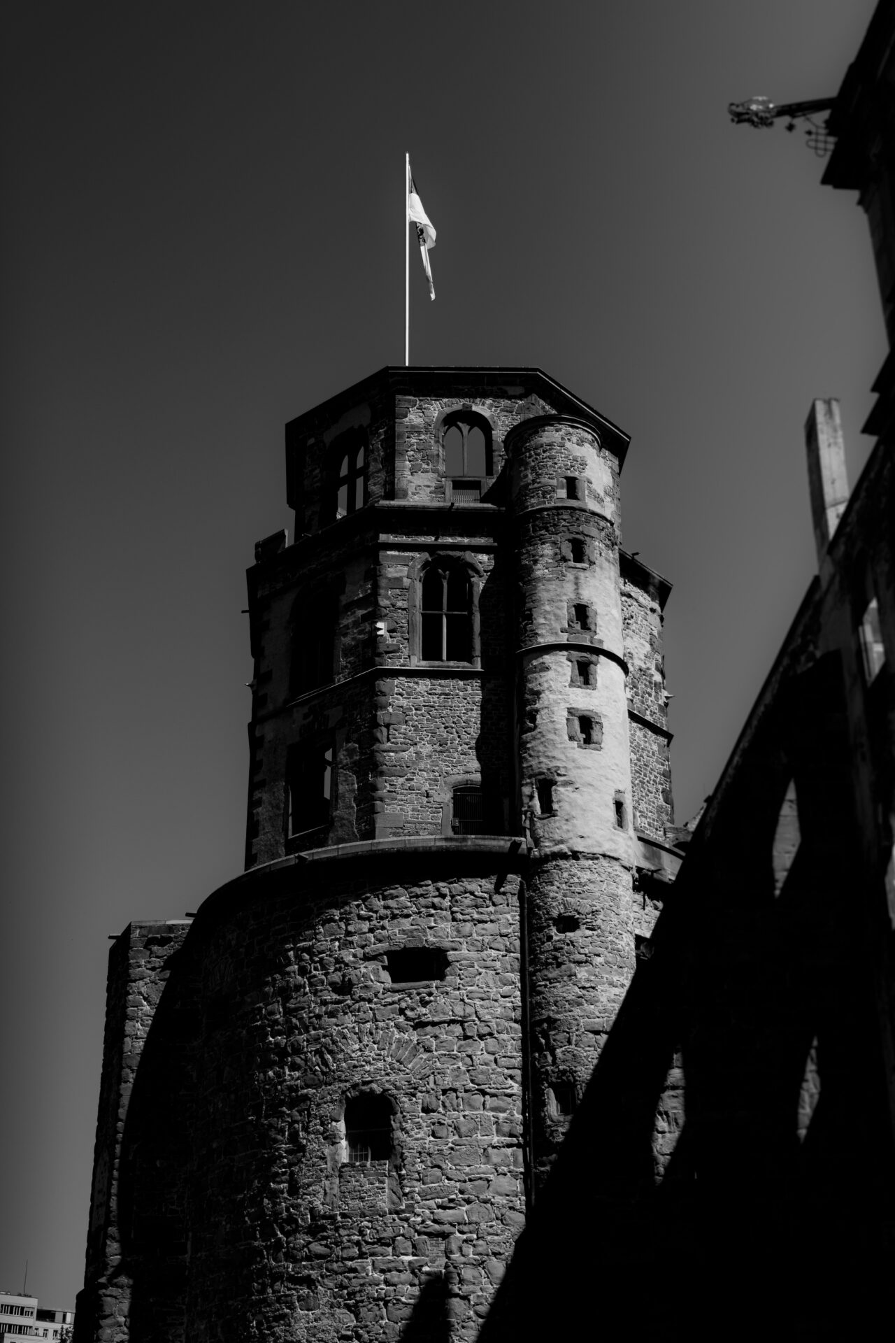 A tall stone tower of Heidelberg Castle