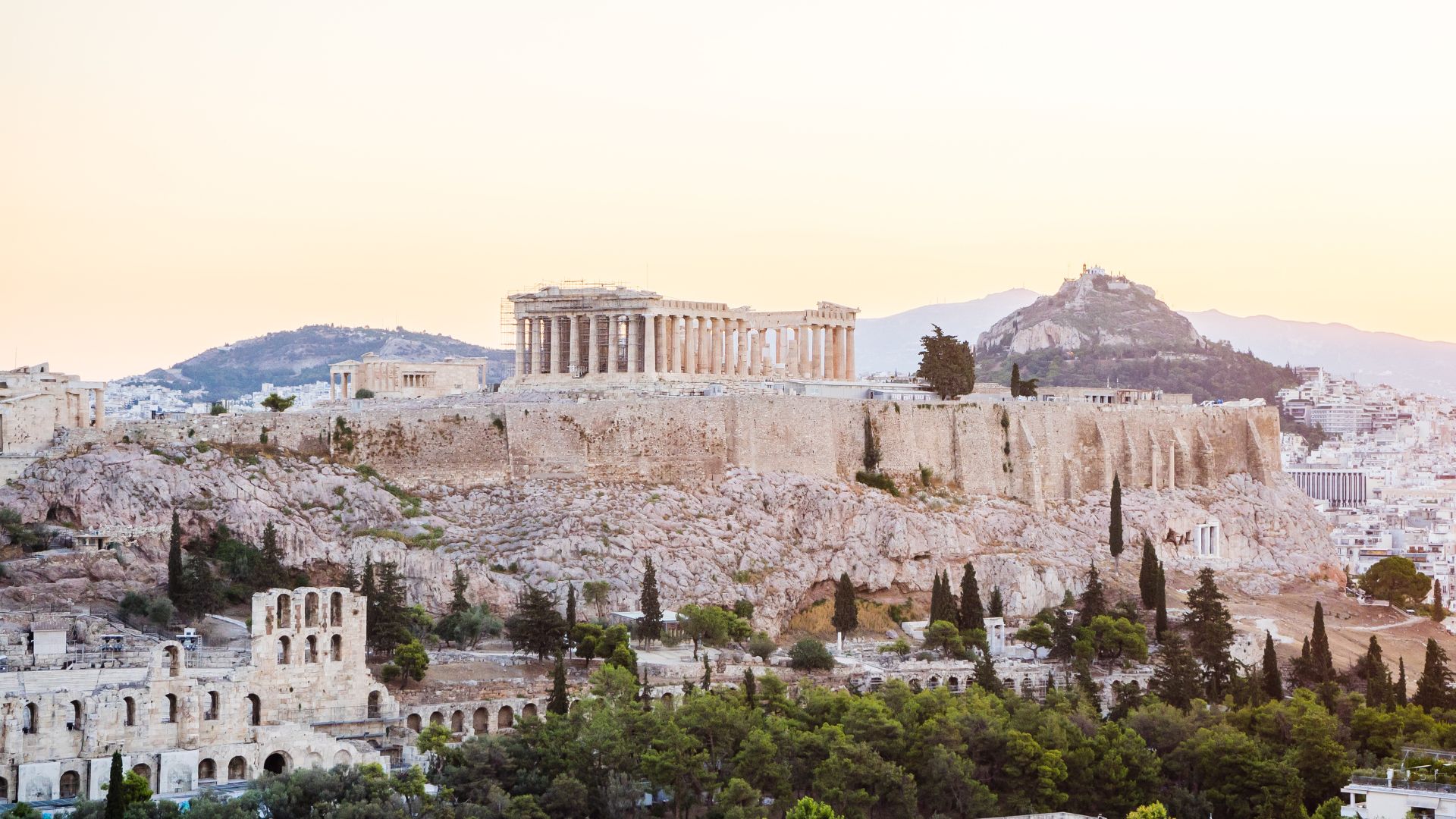Acropolis in Athens, Greece perched on a mountain cliff. 