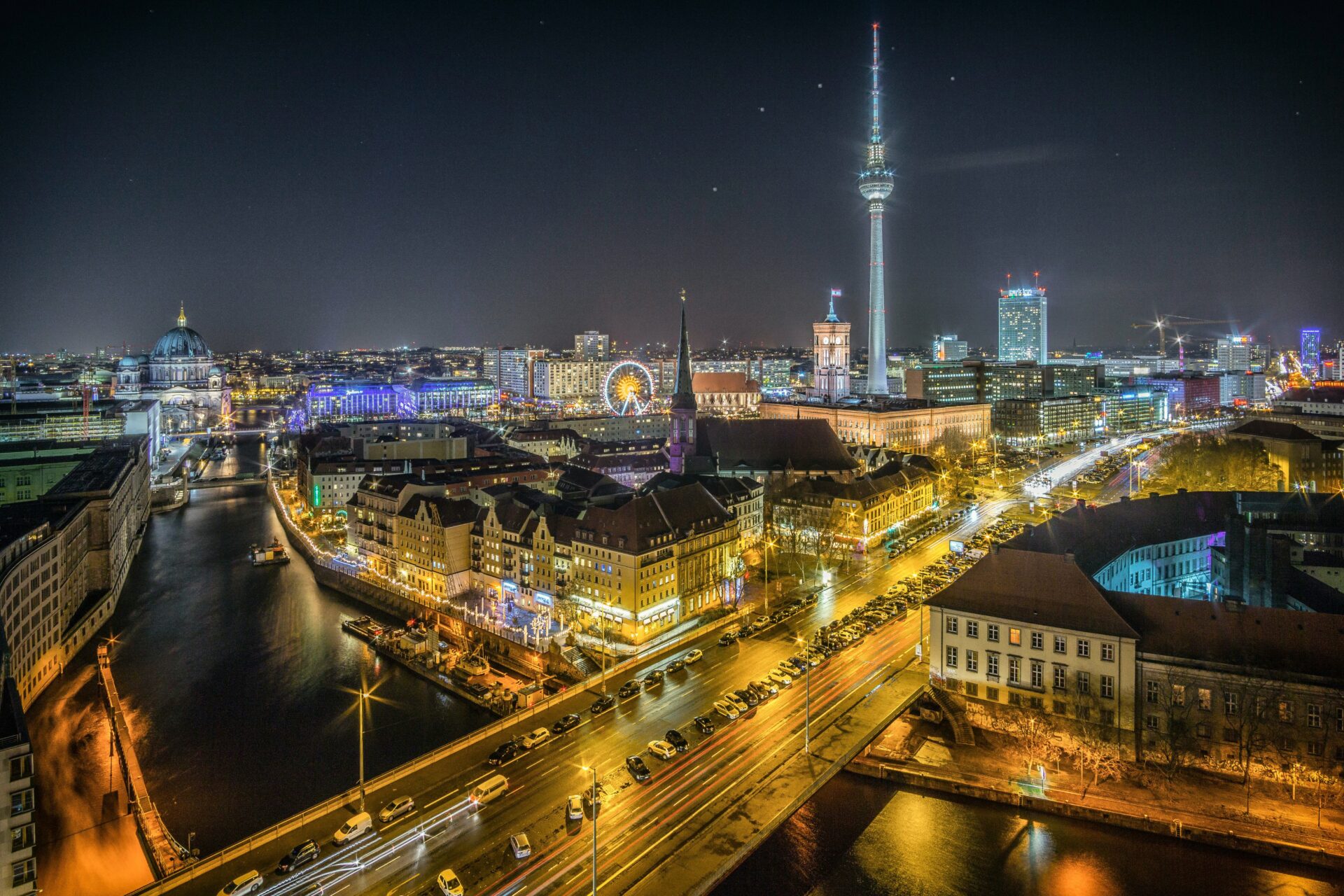 Berlin cityscape at night with illuminated landmarks
