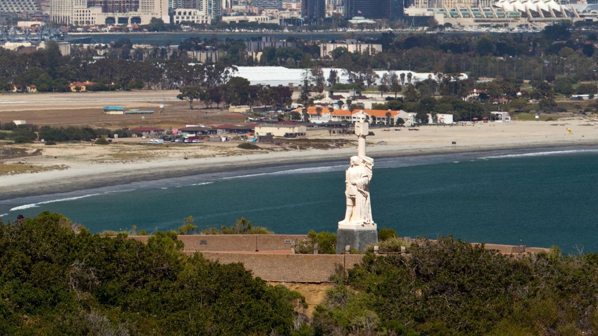 Cabrillo National Monument in San Diego, California, featuring the statue of Juan Rodriguez Cabrillo overlooking the Pacific Ocean and San Diego Bay from Point Loma.