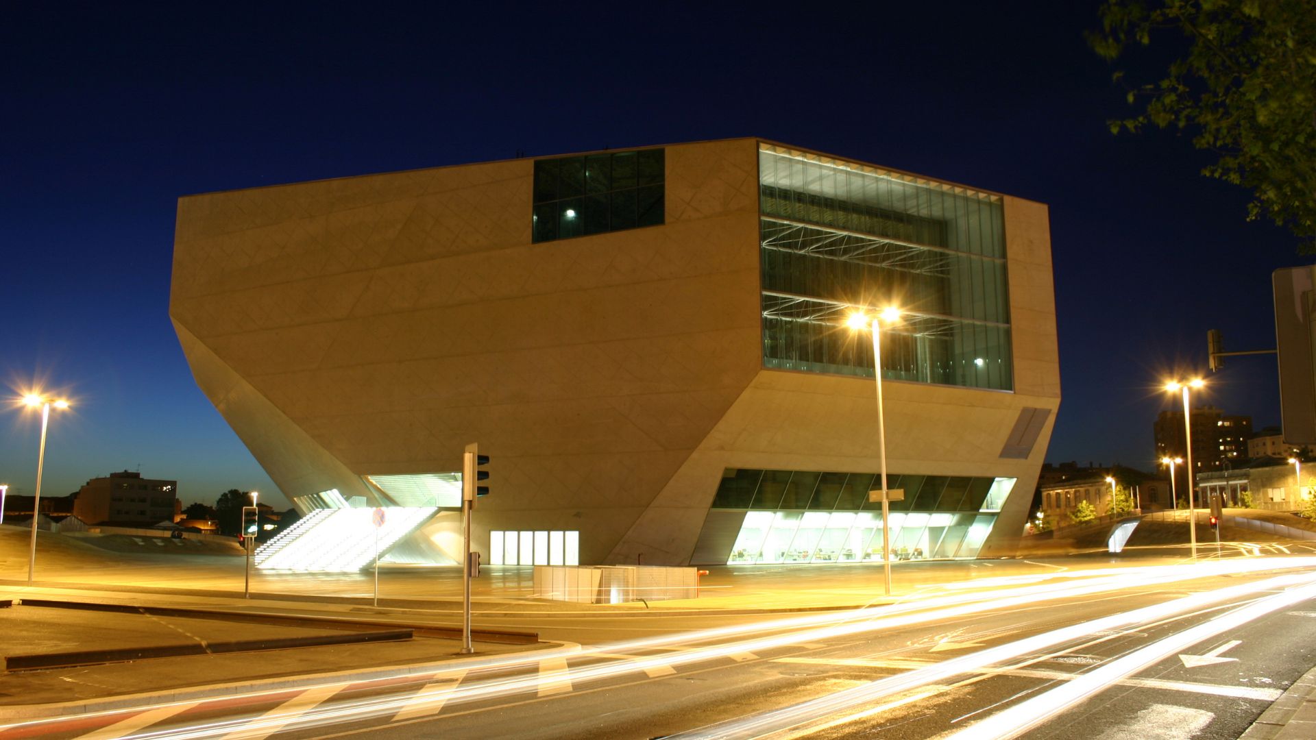 Exterior view of the Casa da Música in Porto, Portugal, a modern concert hall known for its unique architectural design.