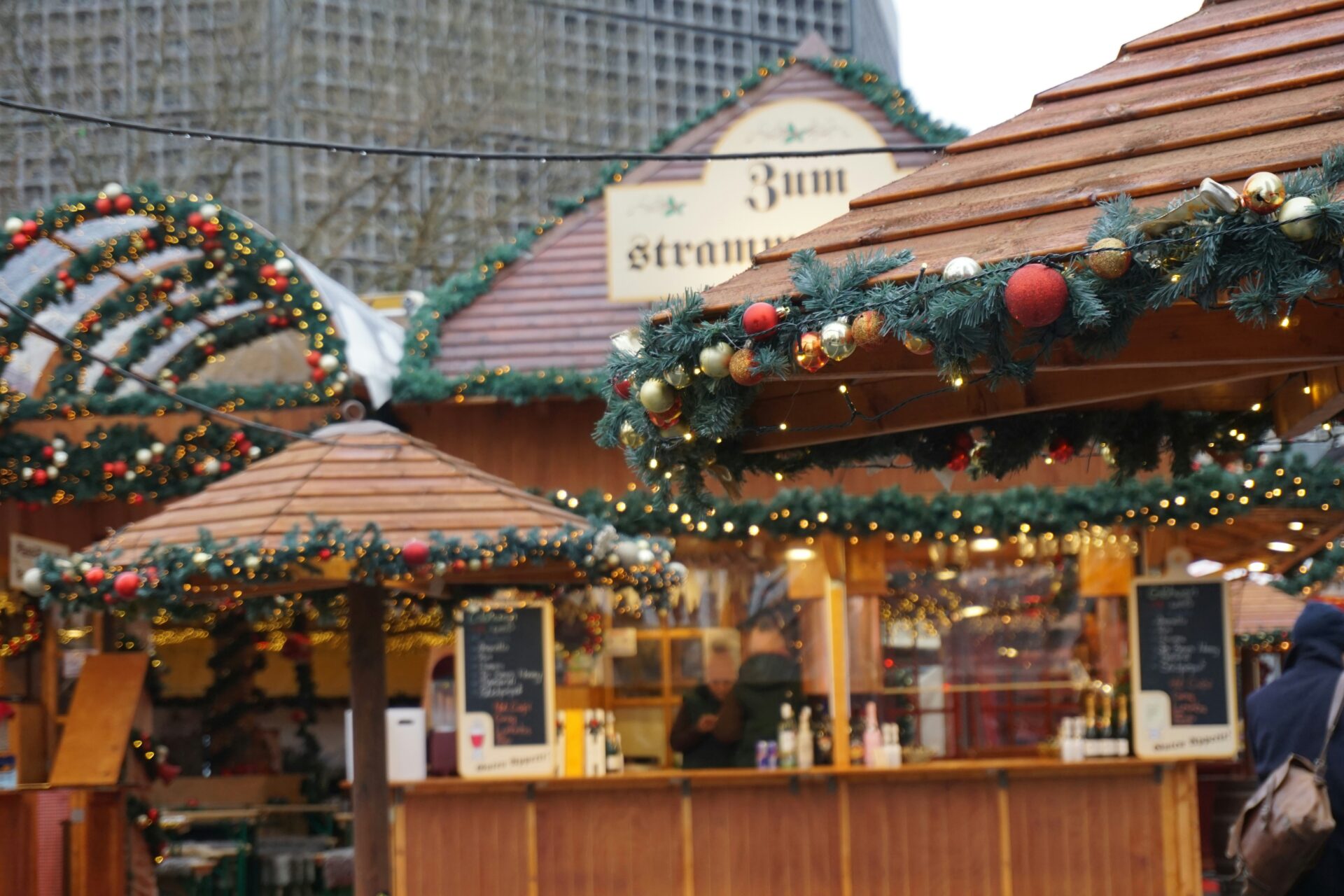Decorated wooden stall selling holiday goods at Gendarmenmarkt