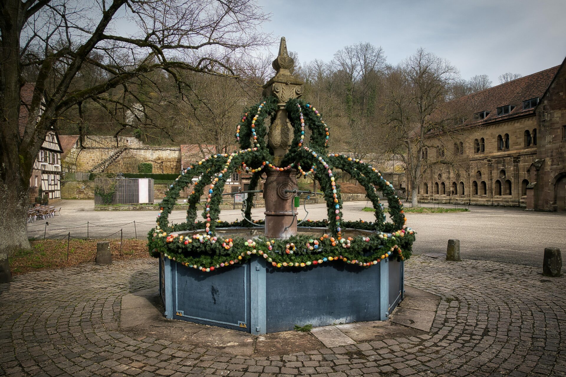 Ornate stone fountain at the center of Maulbronn Monastery