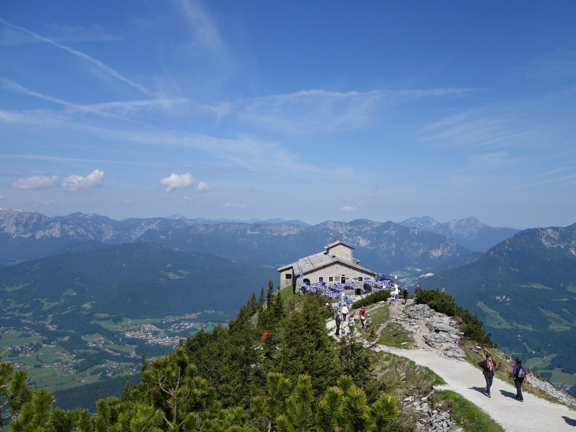Tourists walking toward Eagle's Nest on a sunny summer day