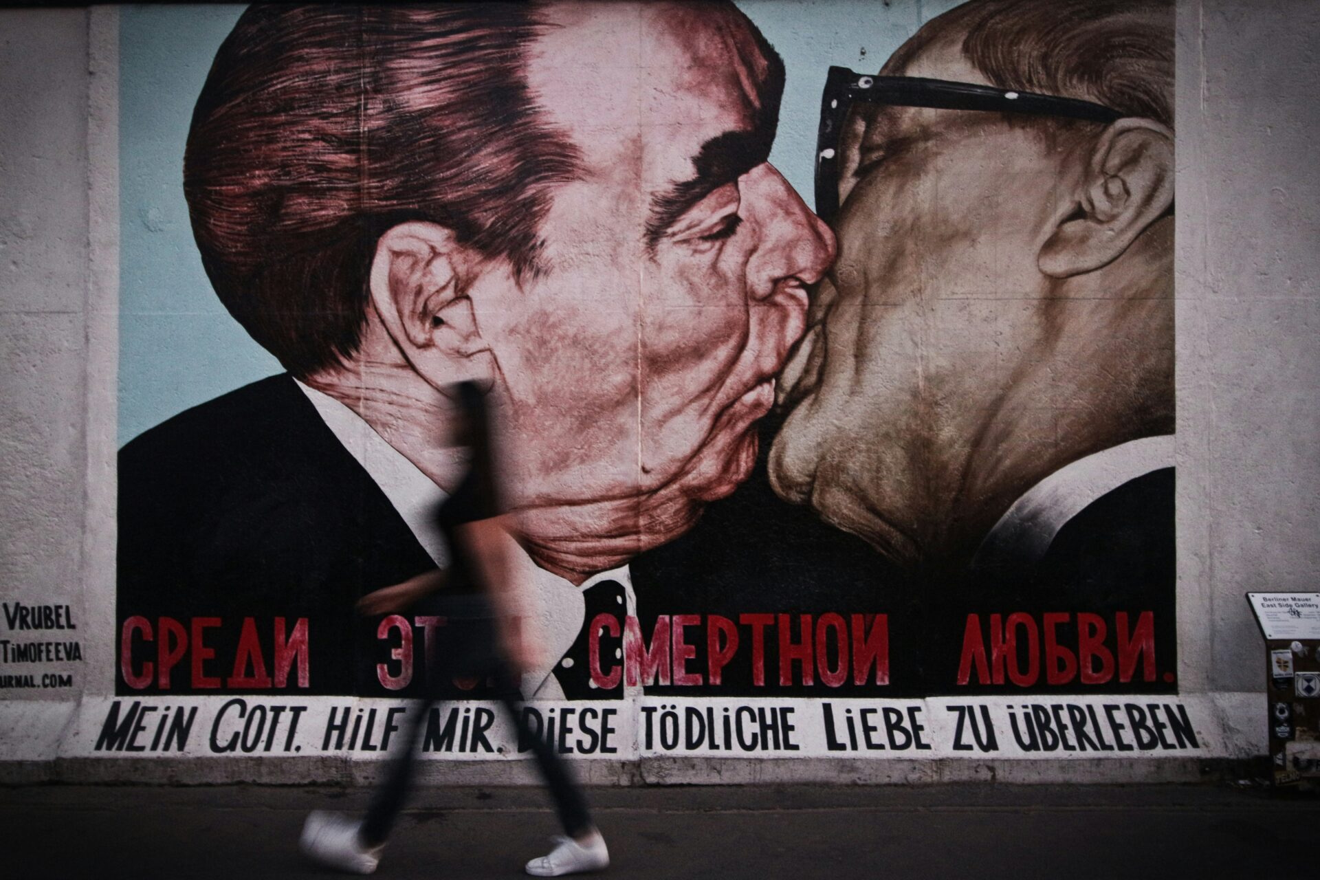 Famous ‘Fraternal Kiss’ mural on Berlin Wall section.