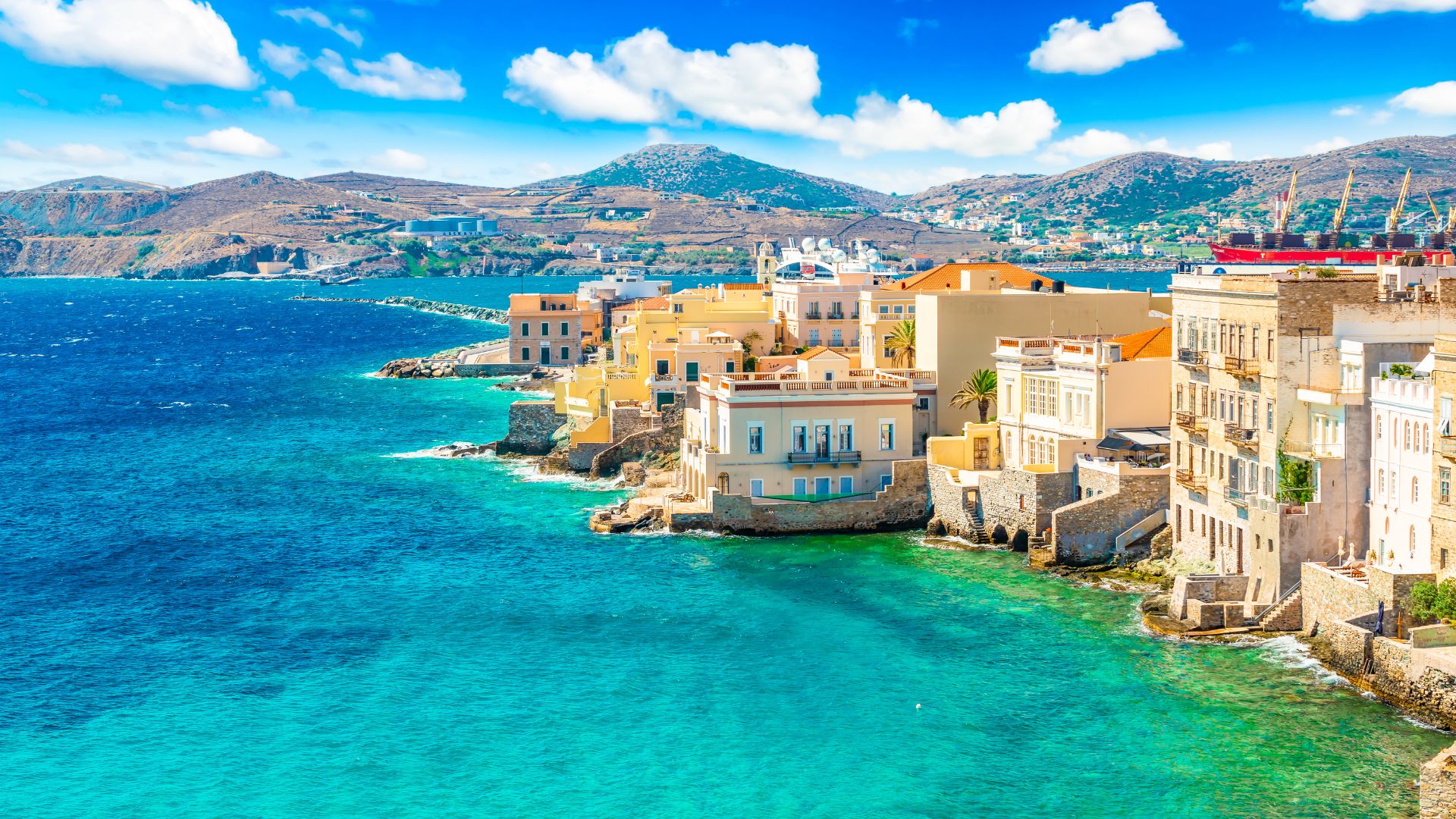Coastal view of Ermoupoli, Syros, Greece, showcasing its unique architecture and seaside location.