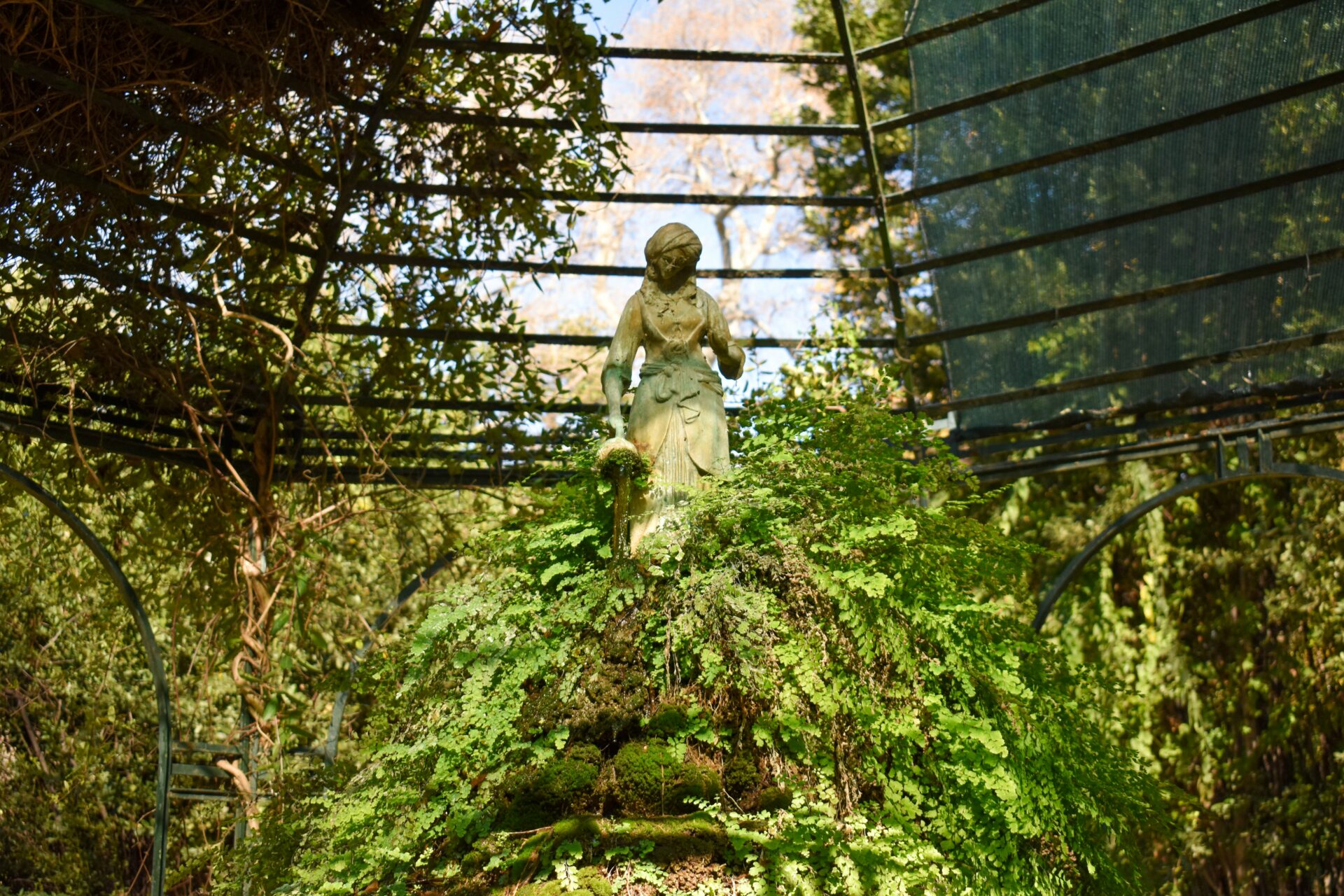 Female statue inside a gazebo - Athens National Garden