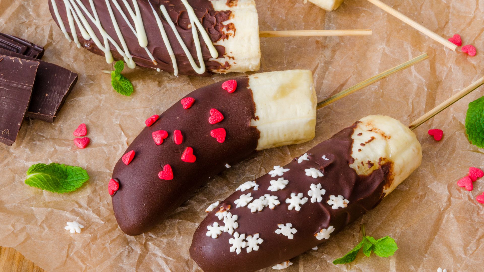 Ripe bananas, dip in chocolate with sprinkles.