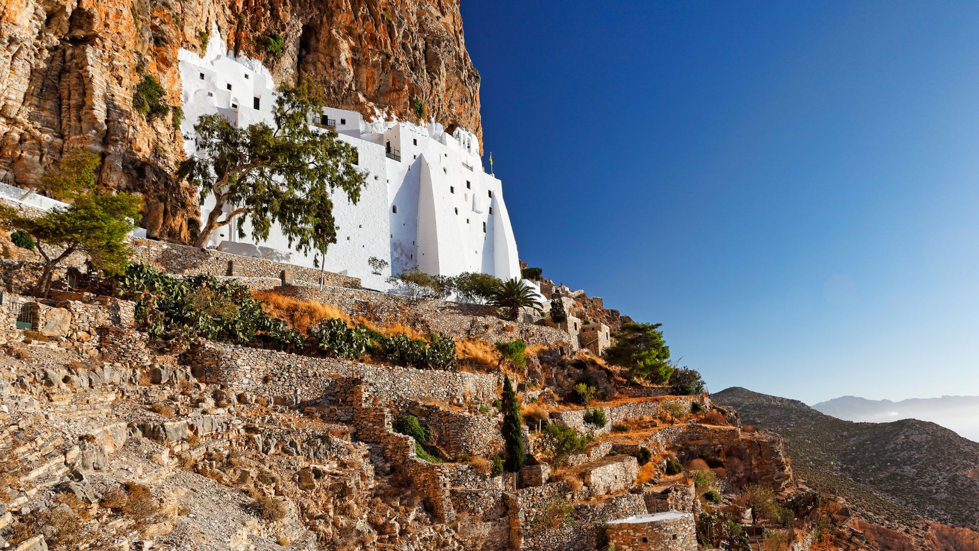 Panagia Hozoviotissa Monastery built into a cliffside in Amorgos, Greece.