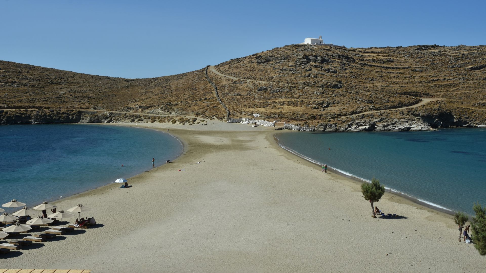Kolona Beach Kythnos Greece - unique double beach with sand strip connecting to islet.
