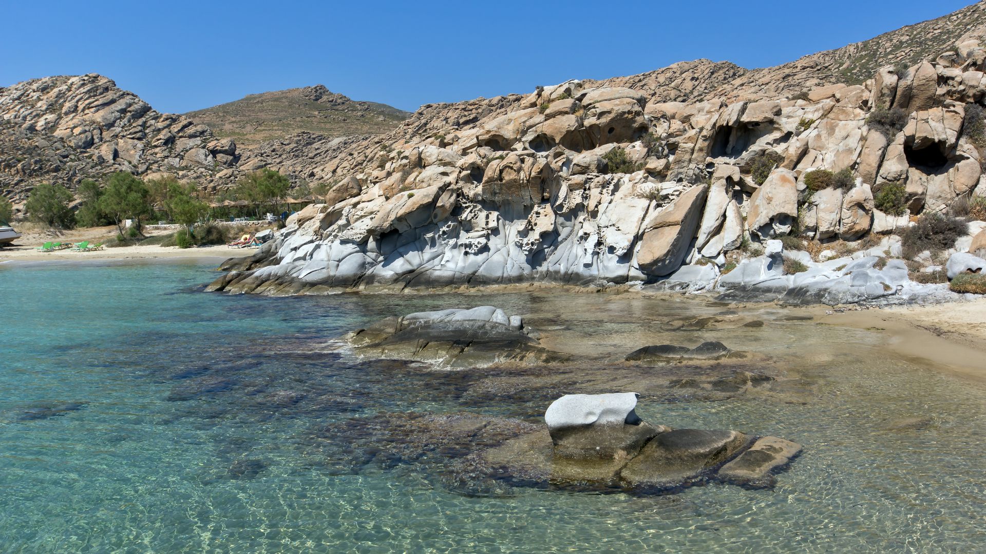 Kolymbithres Beach in Paros, Greece, featuring unique rock formations and clear turquoise water.
