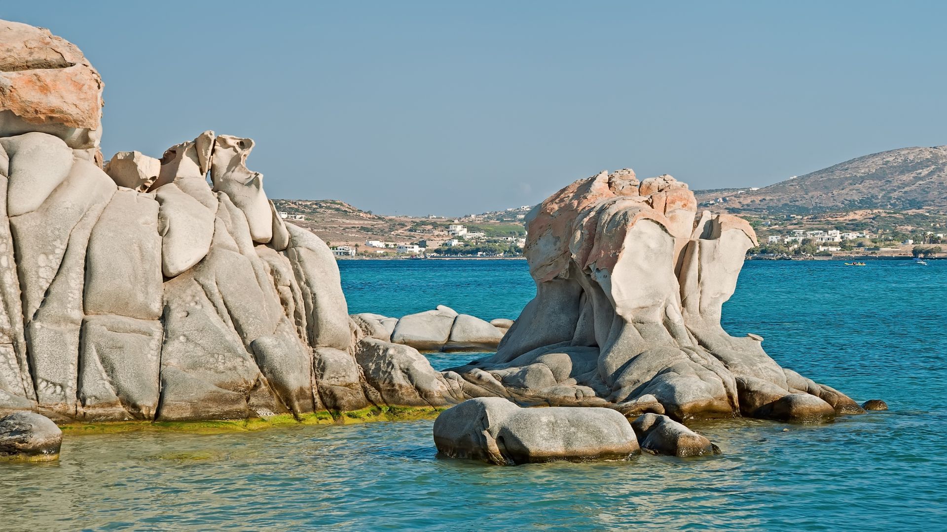 Kolymbithres Beach in Paros, Greece, featuring unique rock formations and clear blue water.