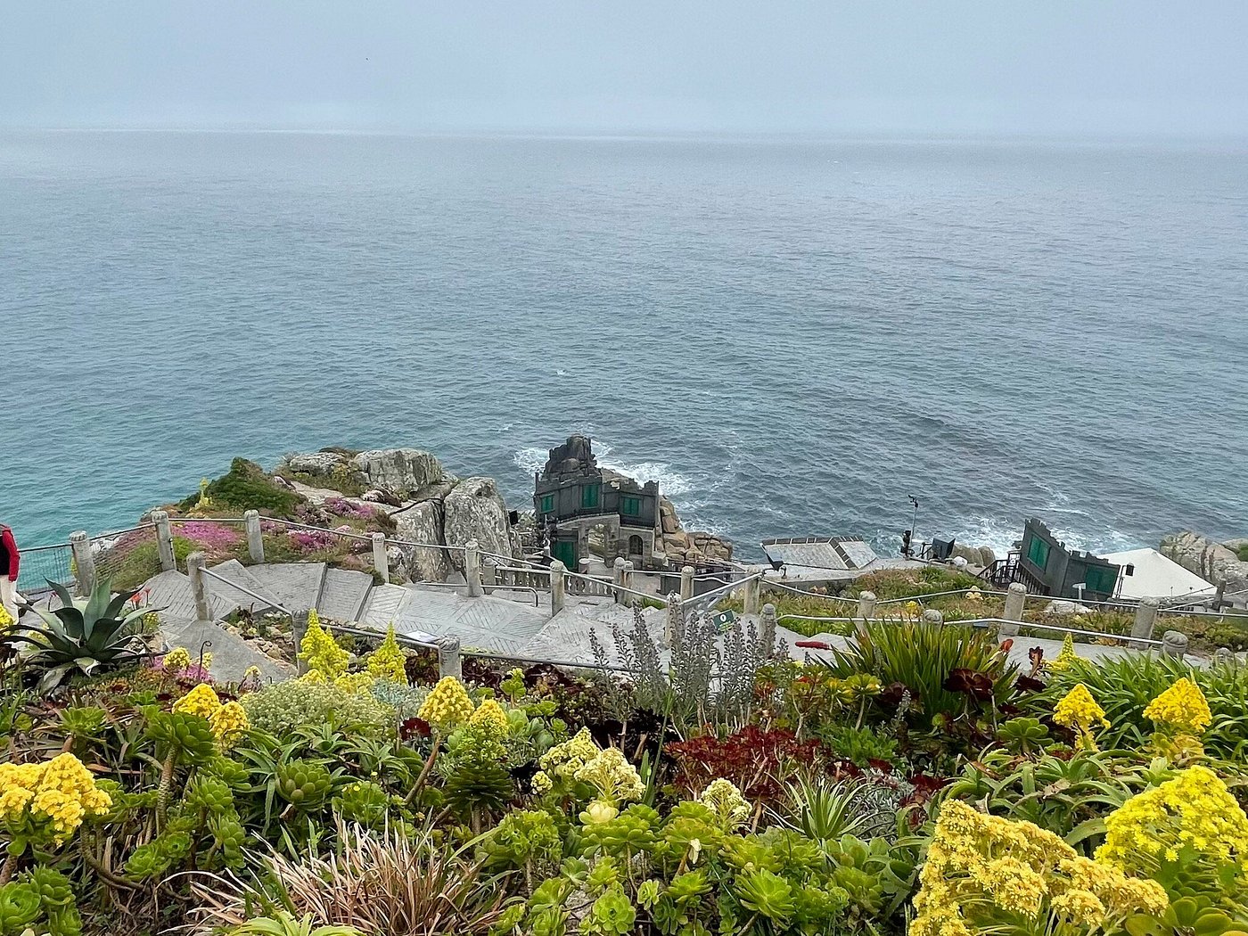 Cliffs surrounding the Minack Theatre, with the sea beyond.