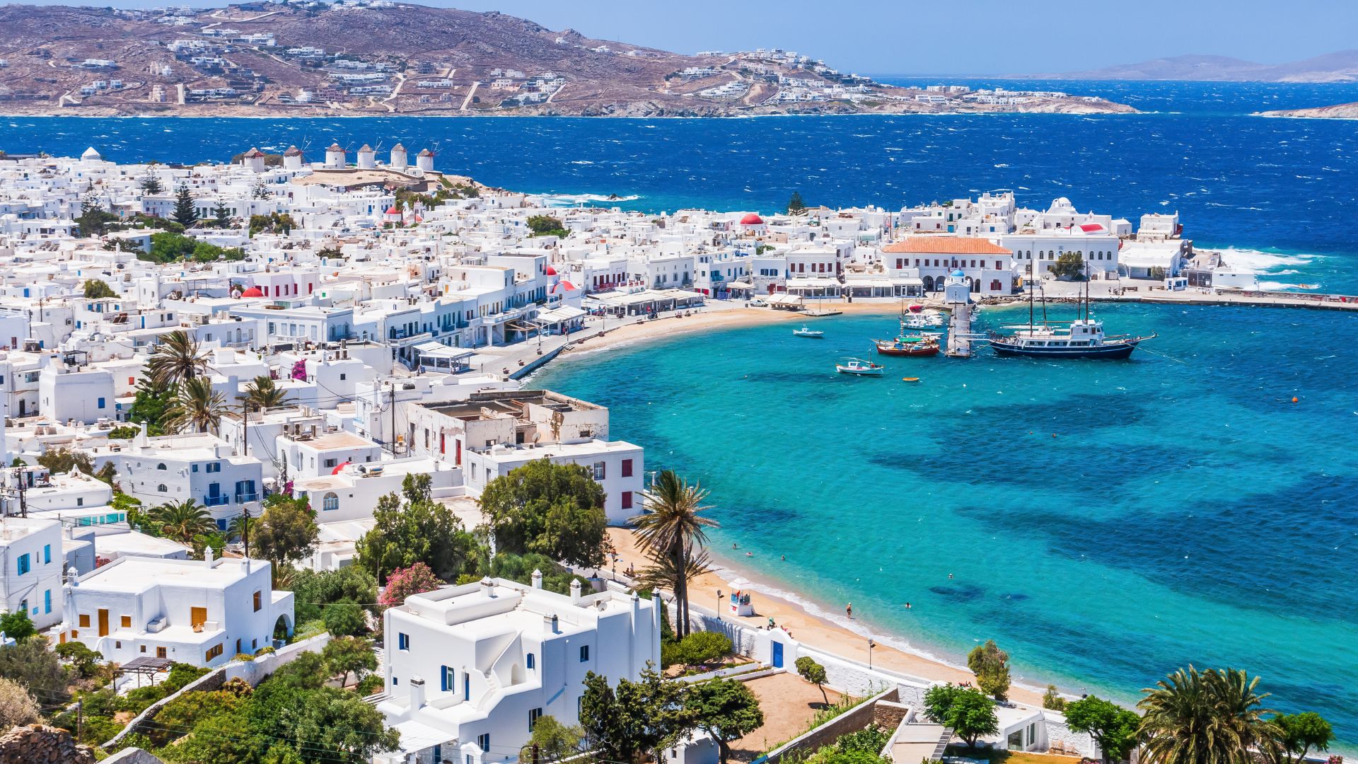 White buildings under a blue sky.